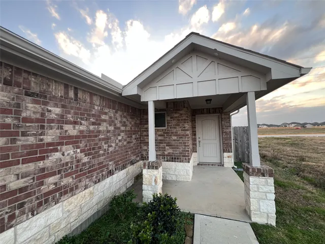 a front view of a house with windows