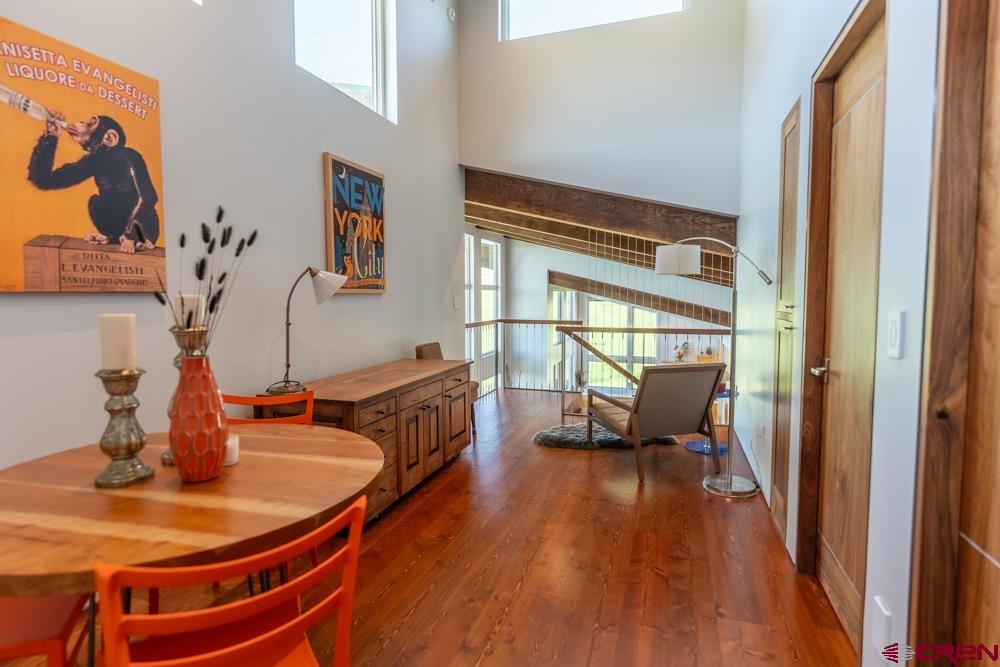347 Overlook Trail Gunnison, CO 81230 - Photo 20 of 45 a dining room with furniture and wooden floor