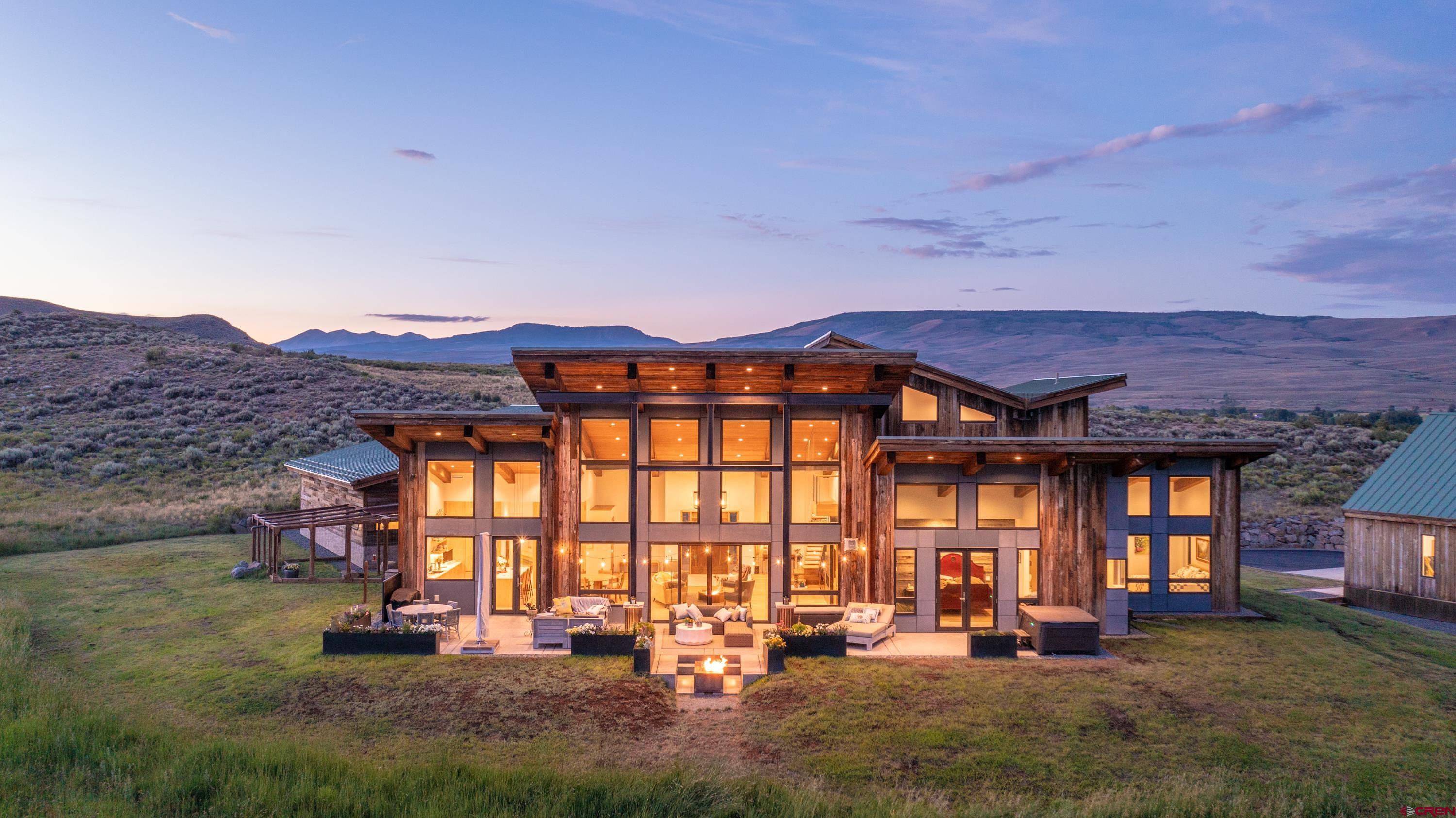347 Overlook Trail Gunnison, CO 81230 - Photo 2 of 45 a front view of a house with patio