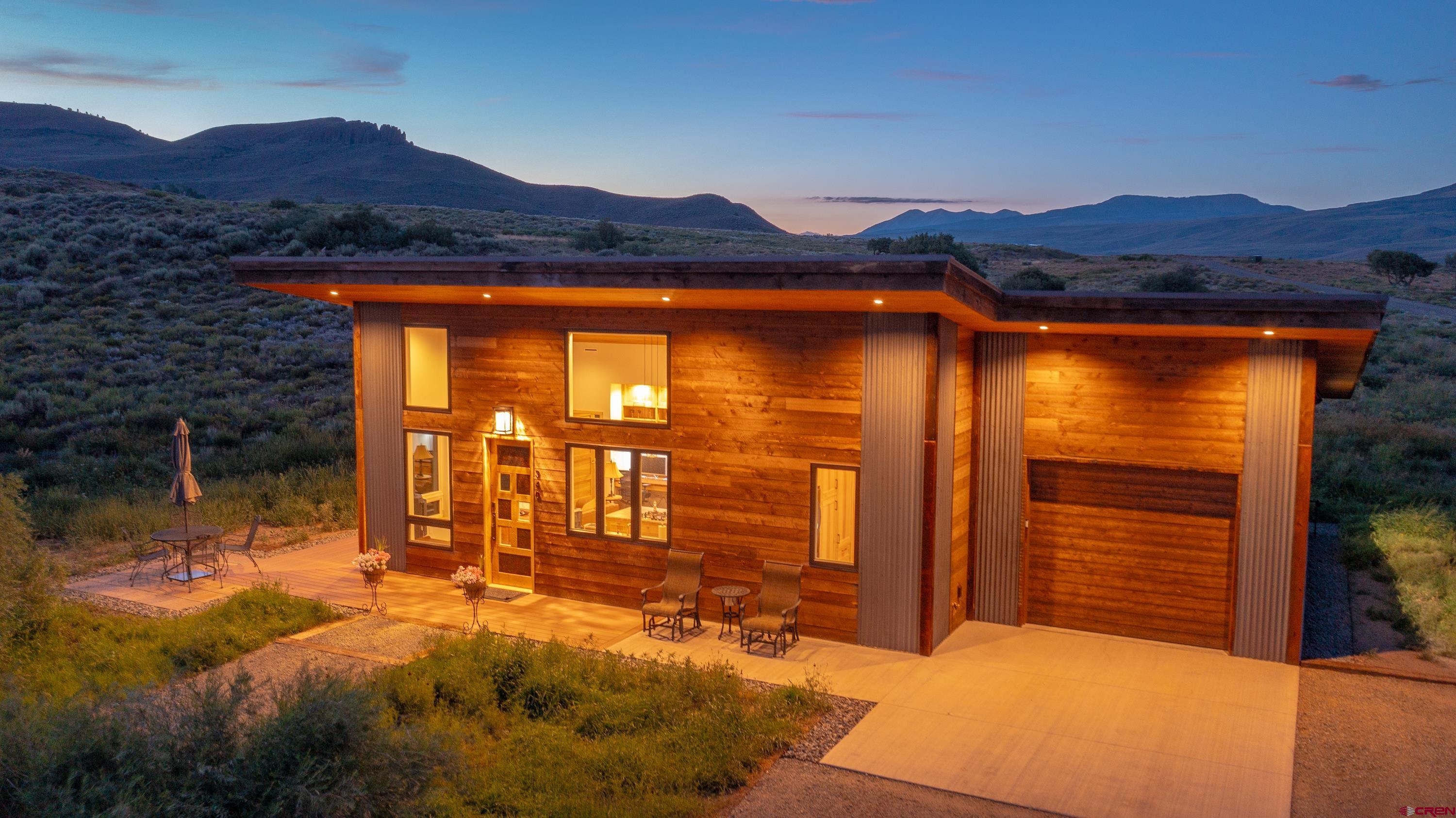 347 Overlook Trail Gunnison, CO 81230 - Photo 24 of 45 a view of outdoor space and front view of a house