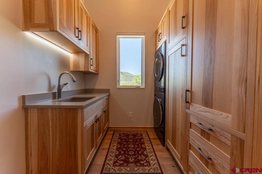 347 Overlook Trail Gunnison, CO 81230 - Photo 36 of 45 a bathroom with a sink and a mirror
