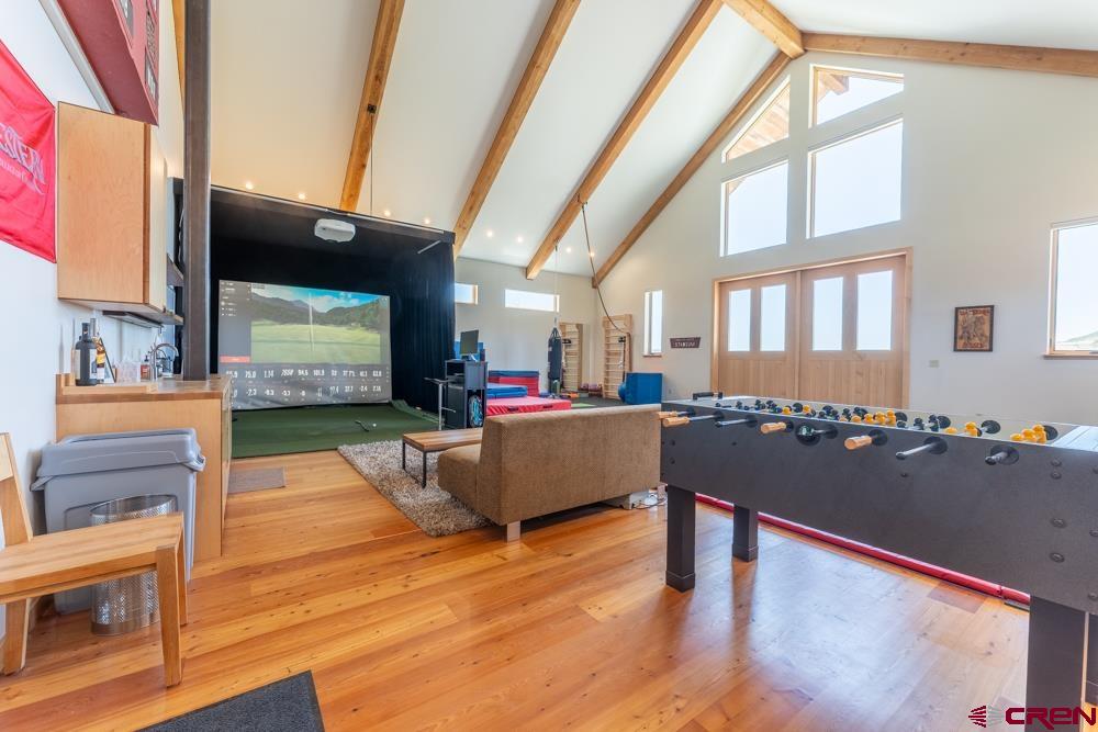 347 Overlook Trail Gunnison, CO 81230 - Photo 38 of 45 a living room with furniture and a flat screen tv
