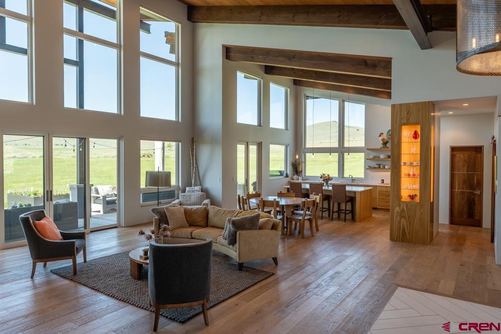 347 Overlook Trail Gunnison, CO 81230 - Photo 10 of 45 a living room with furniture and large windows