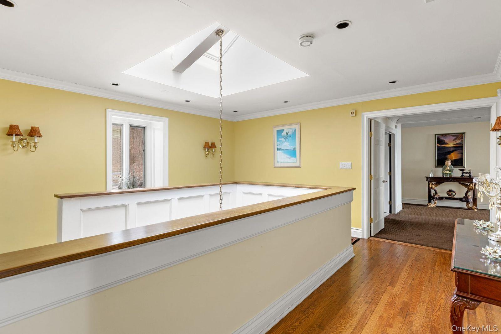 33 Beach Road Northport, NY 11768 - Photo 18 of 50 a spacious bathroom with a granite countertop sink and a large mirror