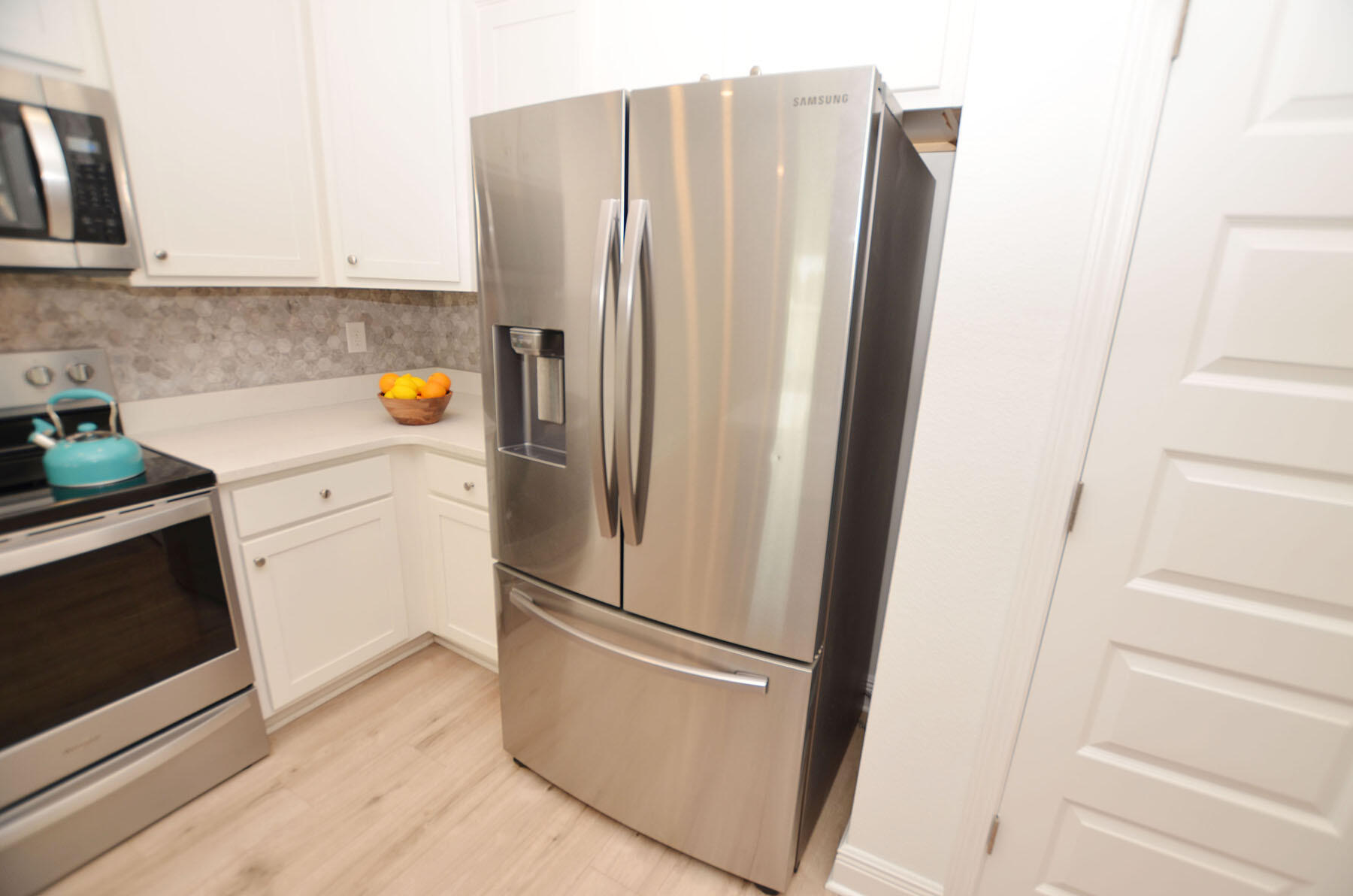 16 Redbird Loop Destin, FL 32541 - Photo 13 of 56 a view of kitchen with stainless steel appliances wooden floor and electronic appliances