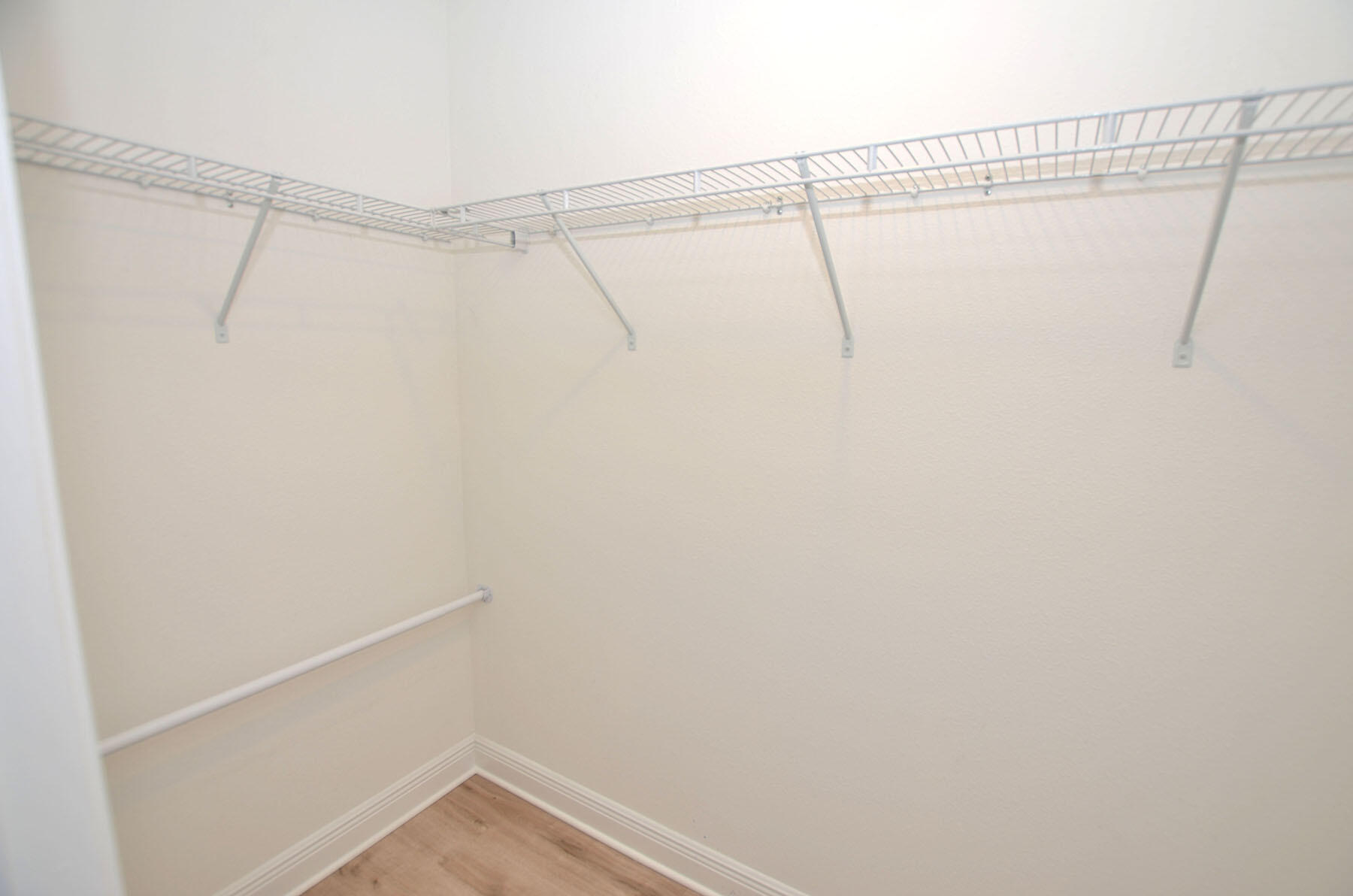 16 Redbird Loop Destin, FL 32541 - Photo 25 of 56 a view of a room with racks on the wall