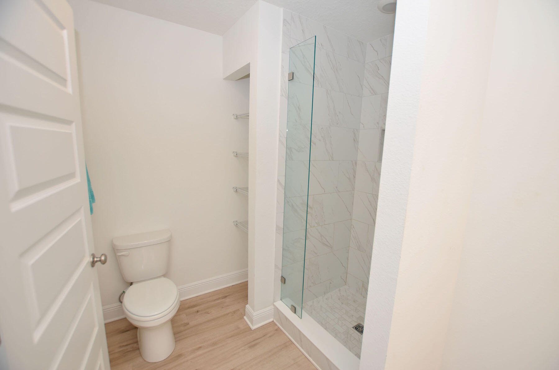 16 Redbird Loop Destin, FL 32541 - Photo 28 of 56 a white toilet sitting next to a shower