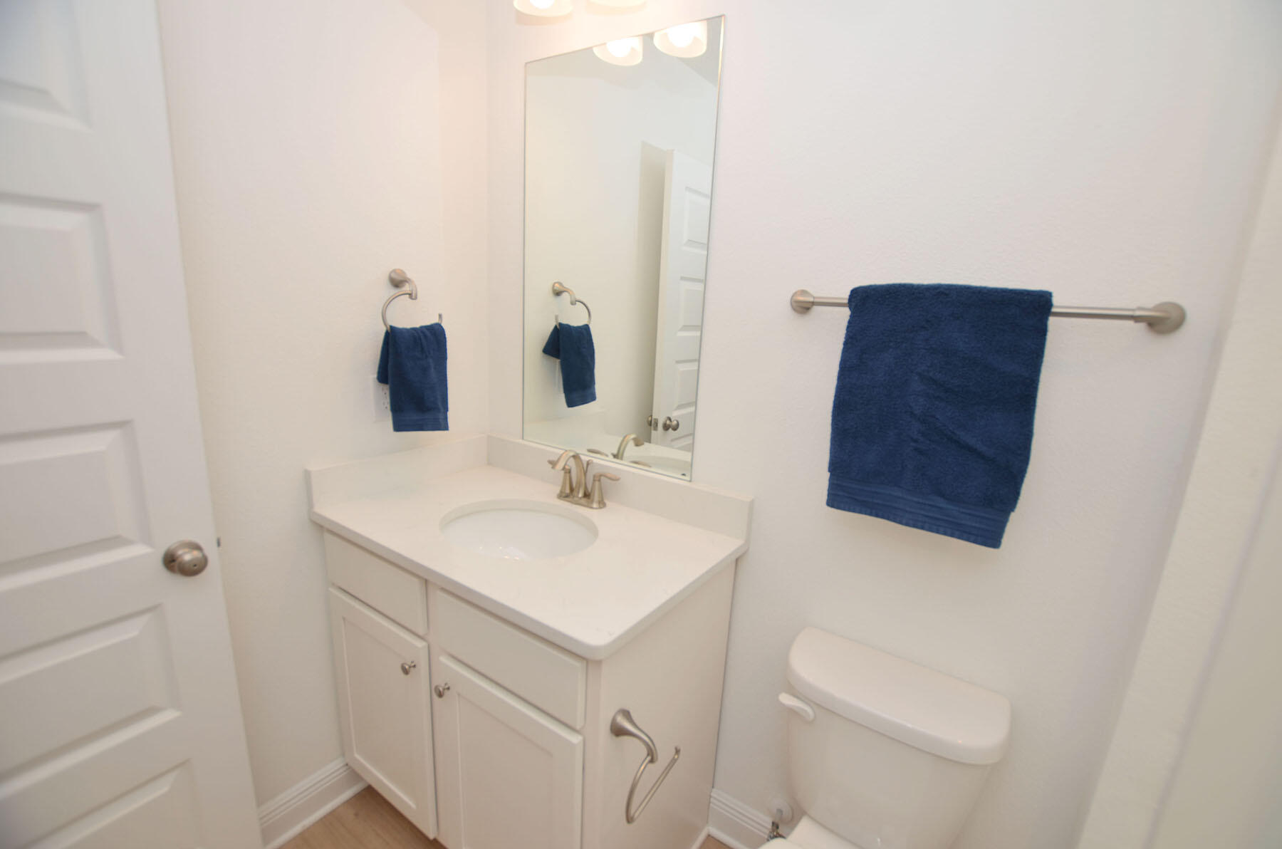 16 Redbird Loop Destin, FL 32541 - Photo 36 of 56 a bathroom with a sink a toilet and mirror