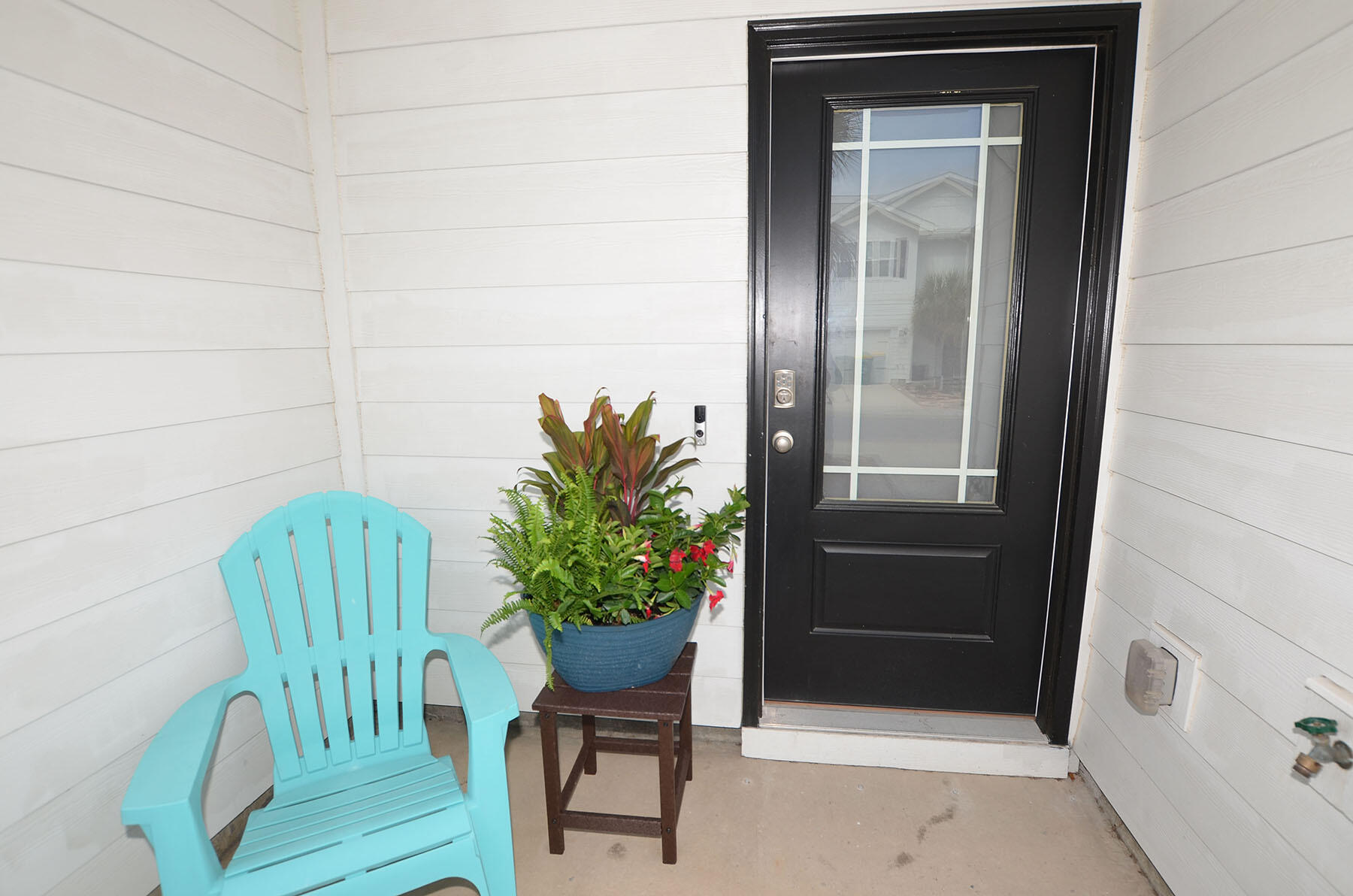 16 Redbird Loop Destin, FL 32541 - Photo 4 of 56 a potted plant sitting in front of a door