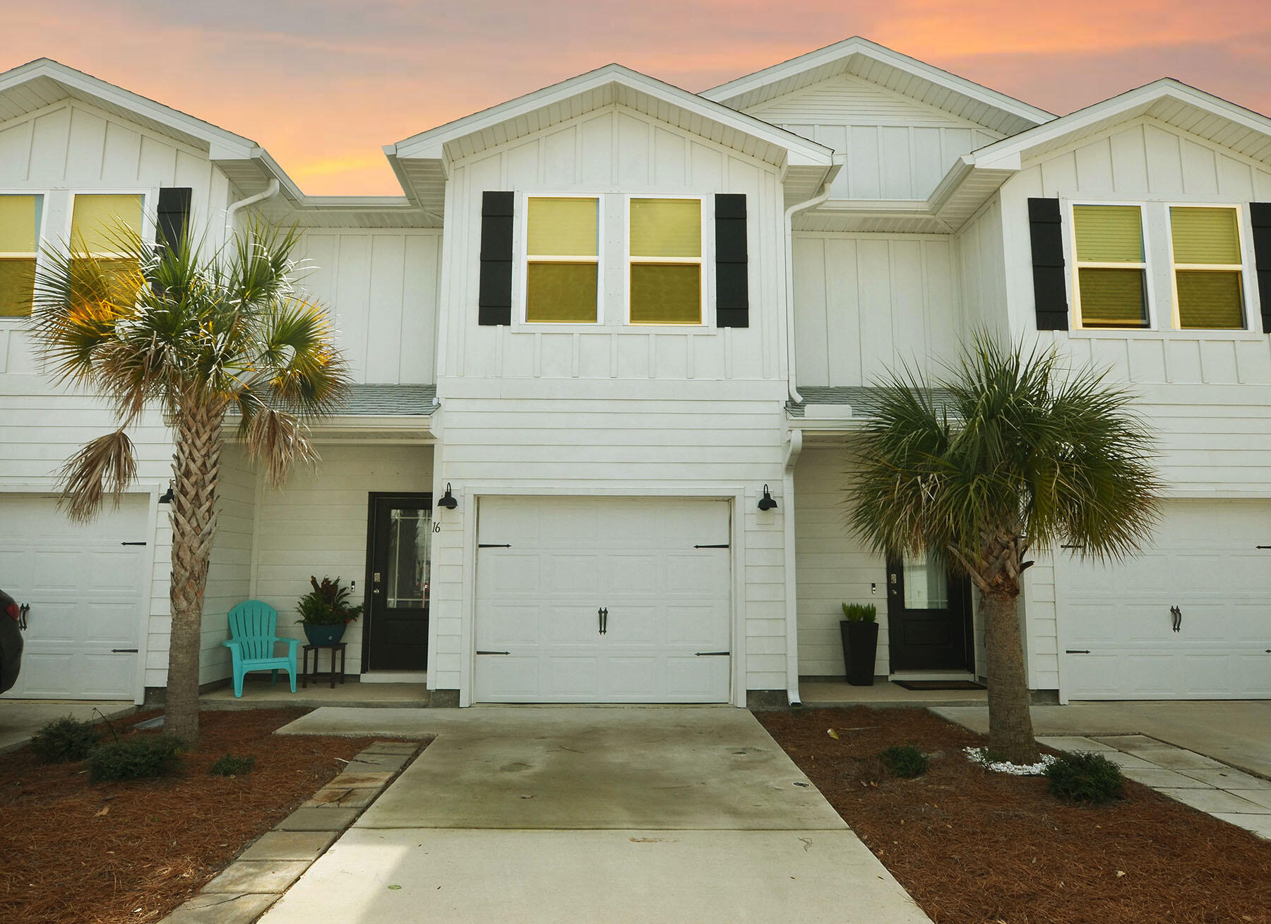 16 Redbird Loop Destin, FL 32541 - Photo 50 of 56 a front view of a house with a yard