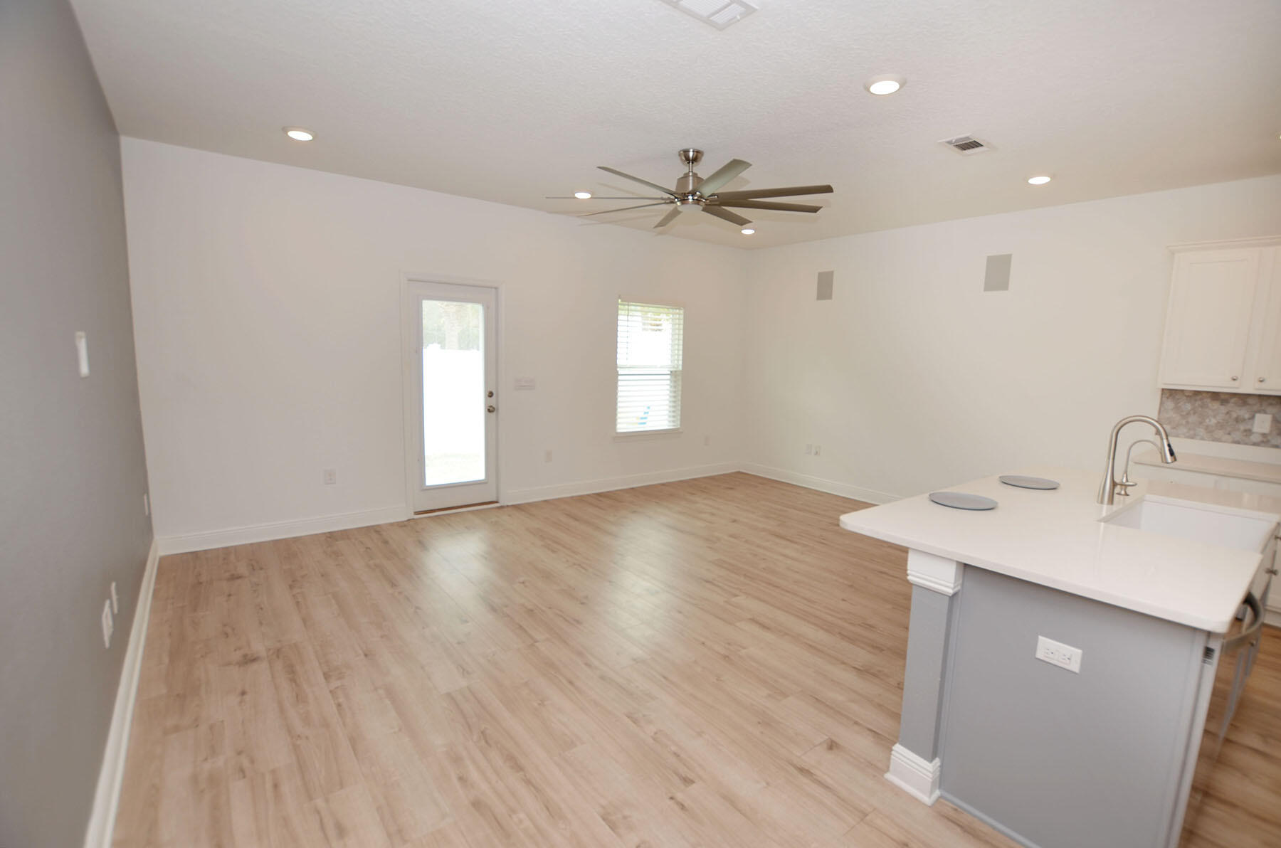 16 Redbird Loop Destin, FL 32541 - Photo 6 of 56 a view of a kitchen sink and wooden floor