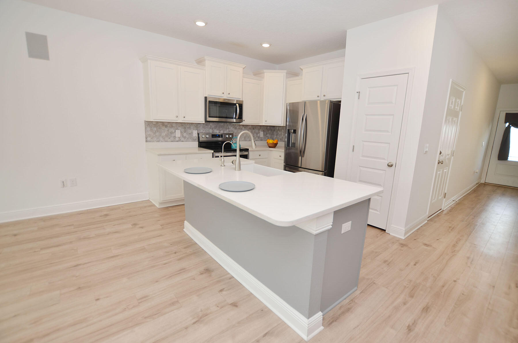16 Redbird Loop Destin, FL 32541 - Photo 10 of 56 a kitchen with stainless steel appliances a sink a stove a refrigerator and cabinets