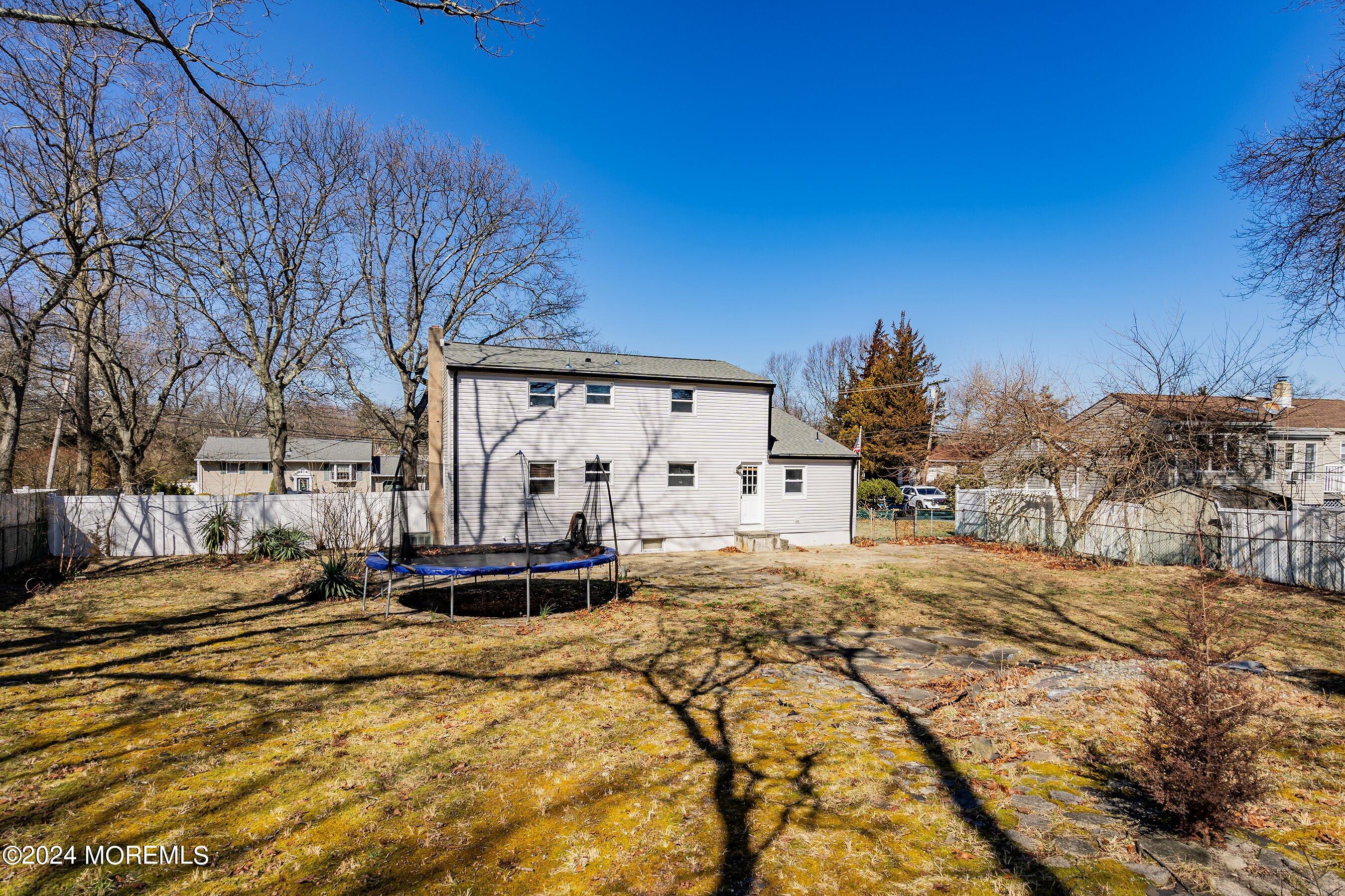 5 Hampton Road Howell, NJ 07731 - Photo 25 of 27 a view of a house with snow on the background
