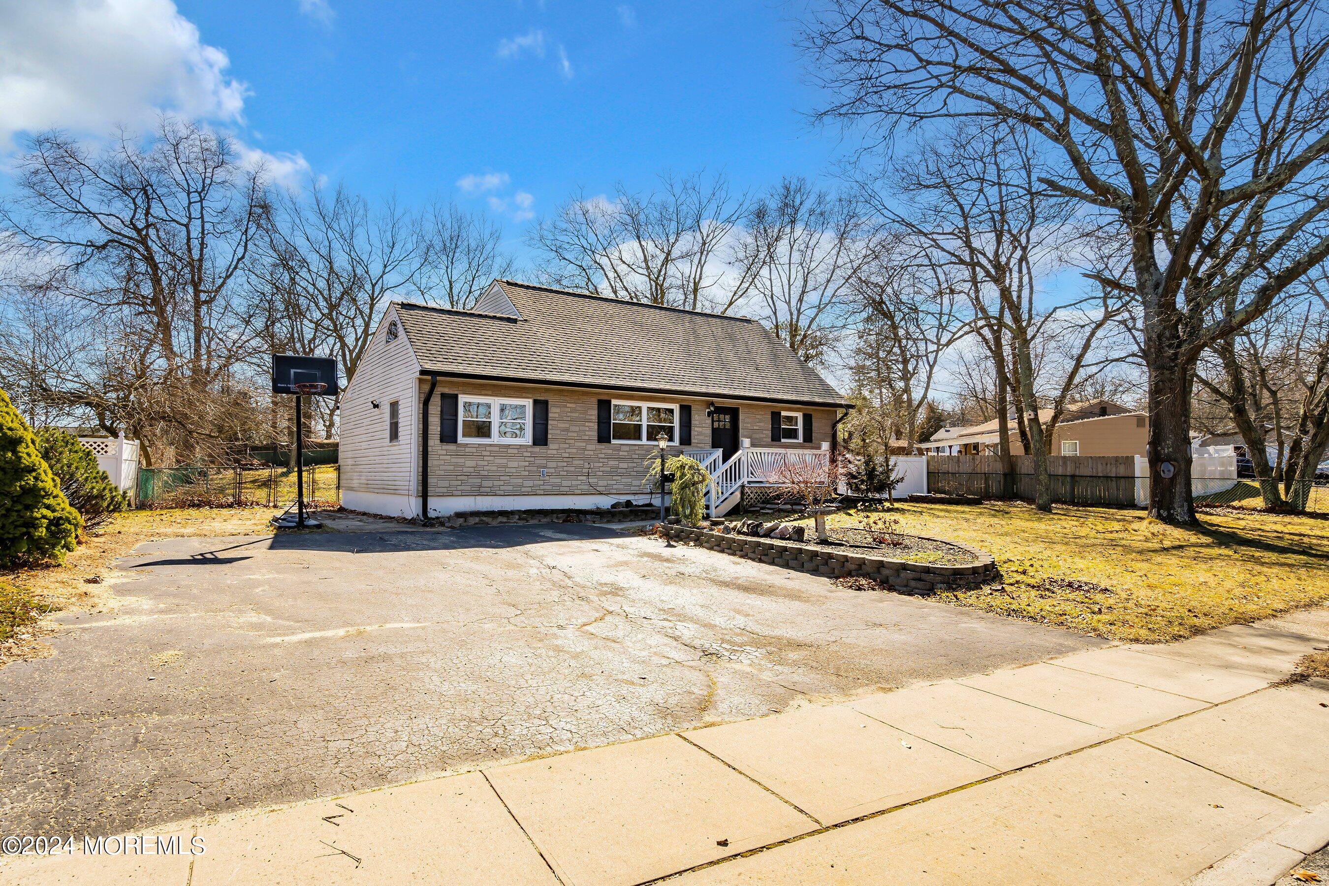 5 Hampton Road Howell, NJ 07731 - Photo 27 of 27 a view of a house with snow on the road