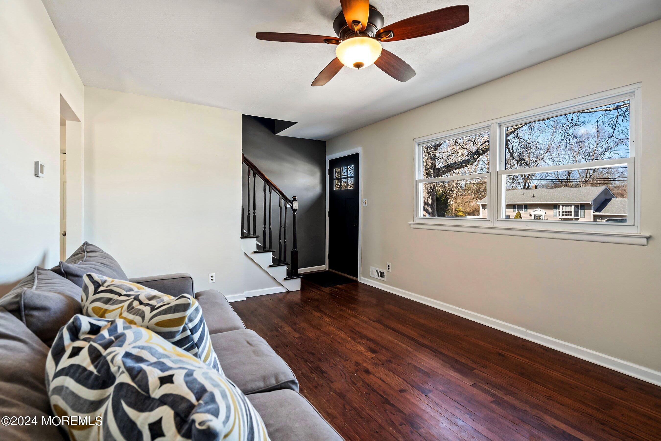 5 Hampton Road Howell, NJ 07731 - Photo 5 of 27 a living room with furniture and wooden floor