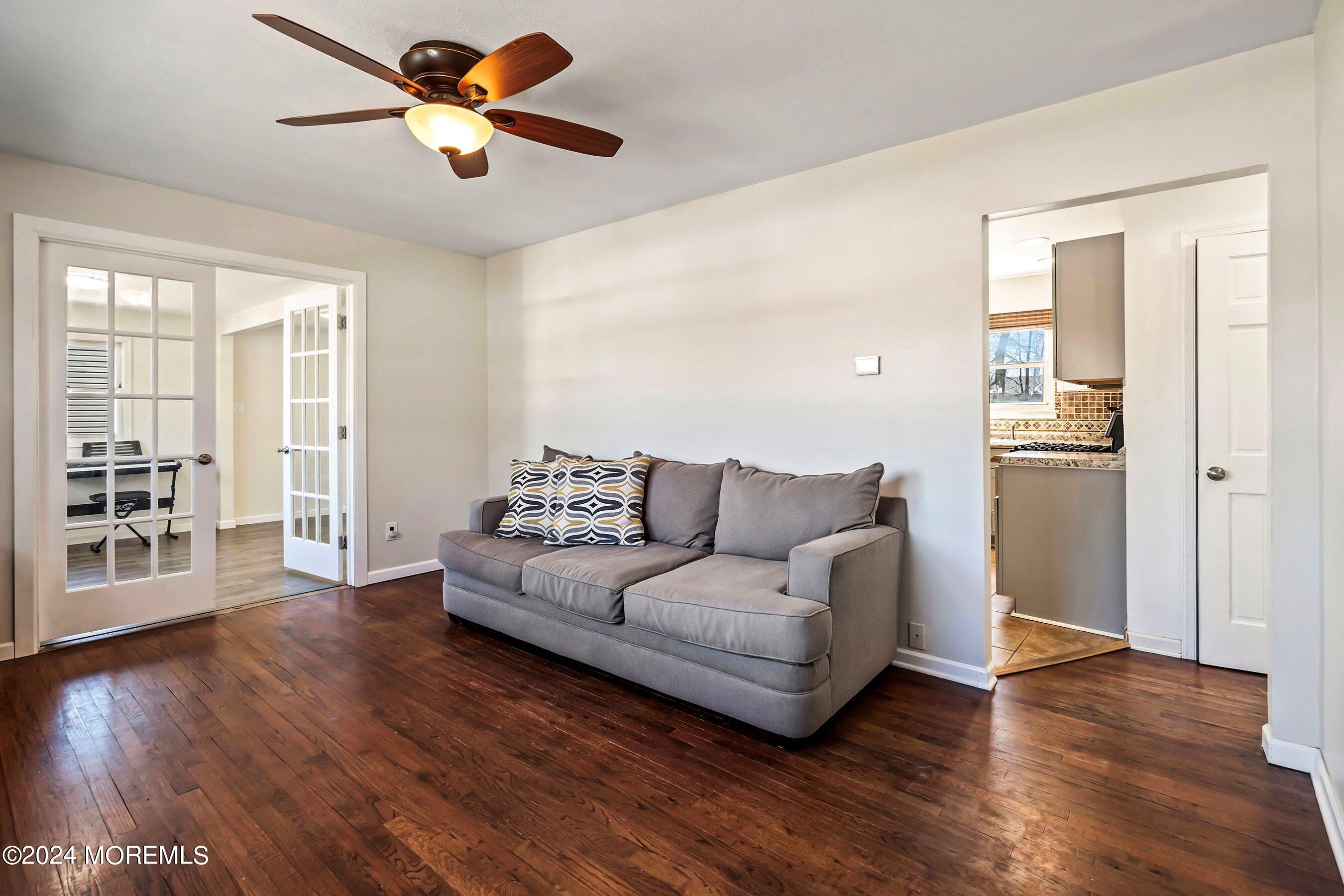 5 Hampton Road Howell, NJ 07731 - Photo 6 of 27 a living room with furniture and a wooden floor
