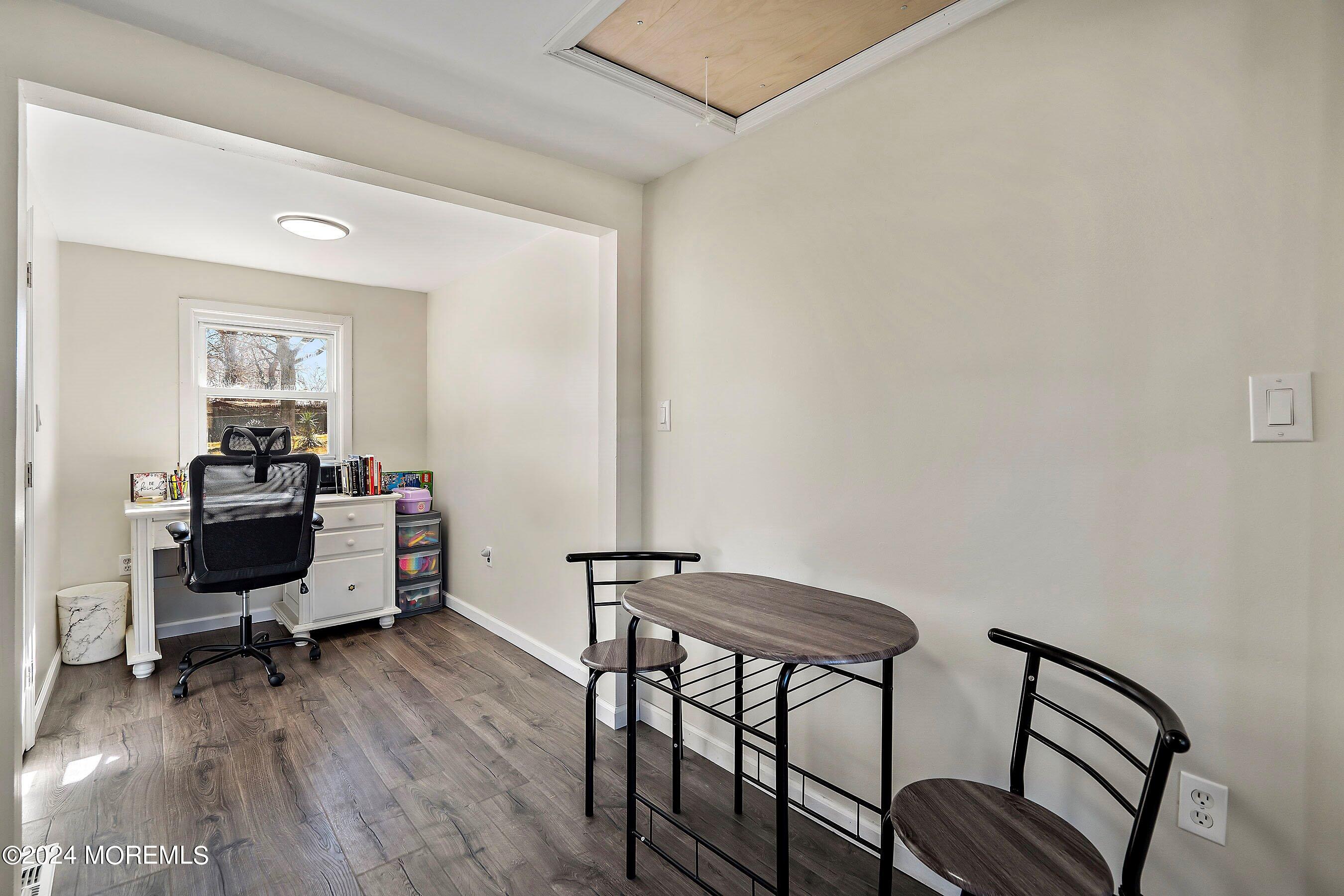 5 Hampton Road Howell, NJ 07731 - Photo 9 of 27 a view of a workspace with furniture and a window