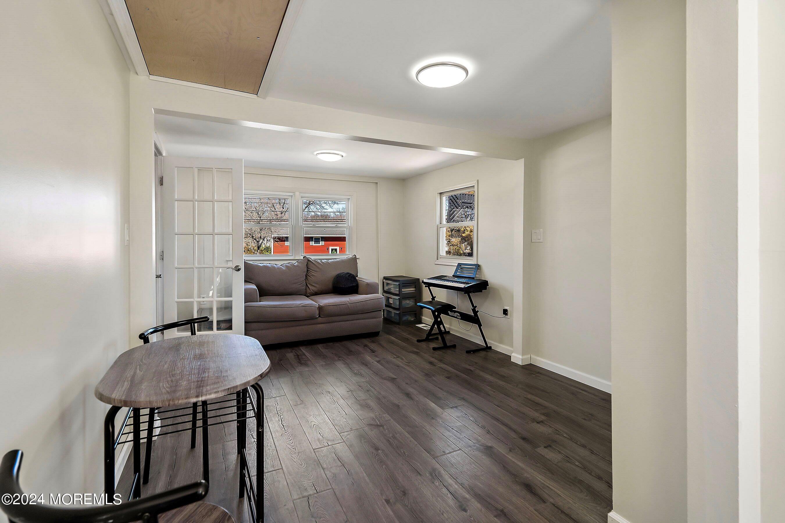 5 Hampton Road Howell, NJ 07731 - Photo 10 of 27 a living room with furniture and a wooden floor