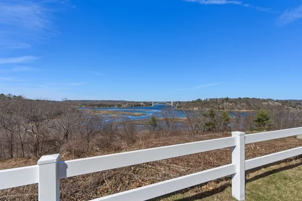 a view of a lake from a balcony
