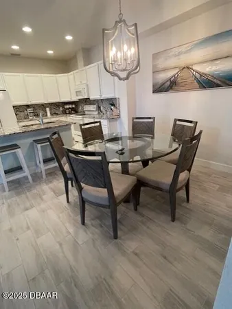 a view of a dining room with furniture