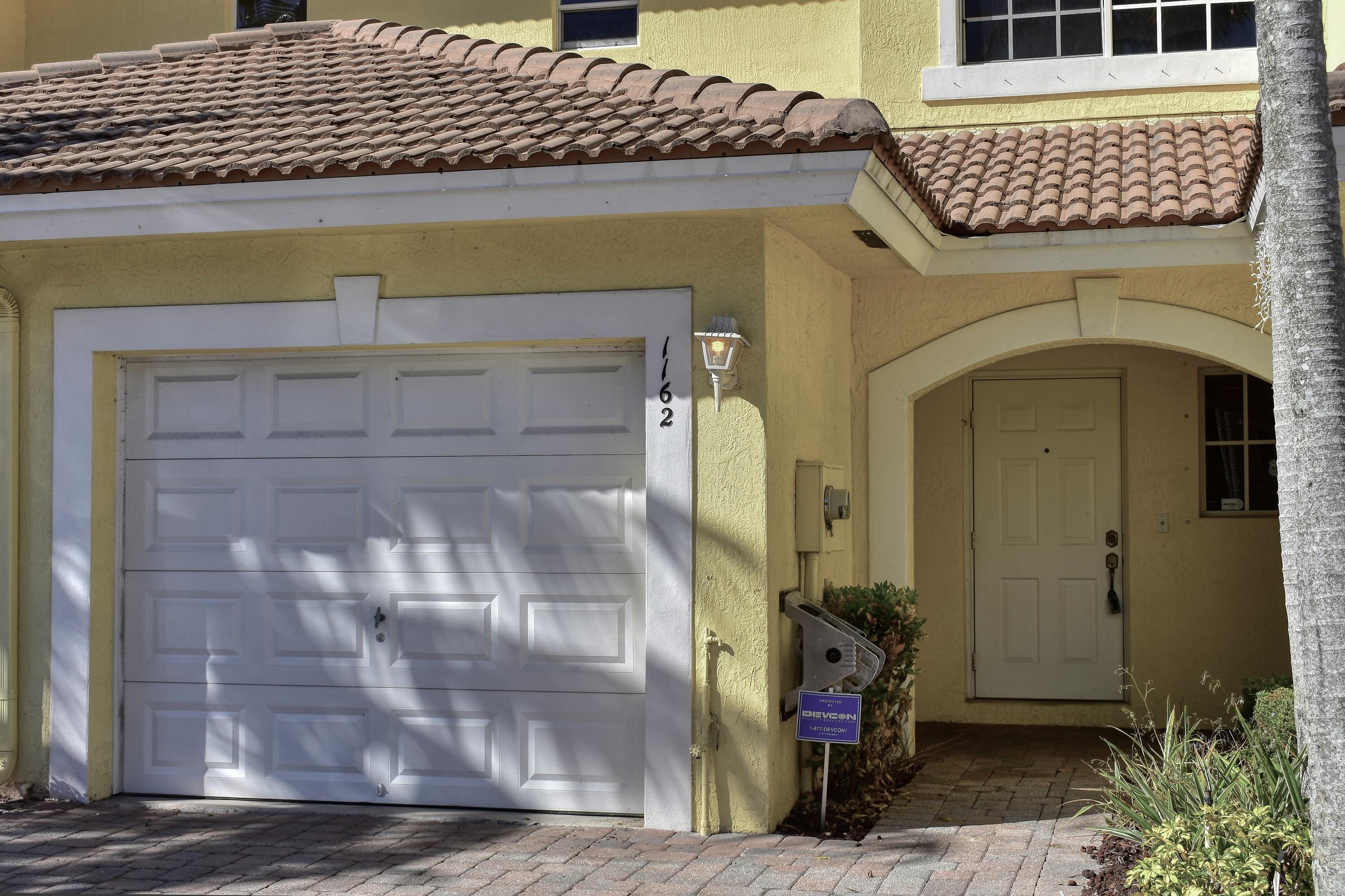 1162 Imperial Lake Road West Palm Beach, FL 33413 - Photo 2 of 21 AB648D3F-2950-4D51-9CB4-8E28B9D4F10D