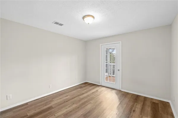 a bathroom with a double vanity sink toilet and shower
