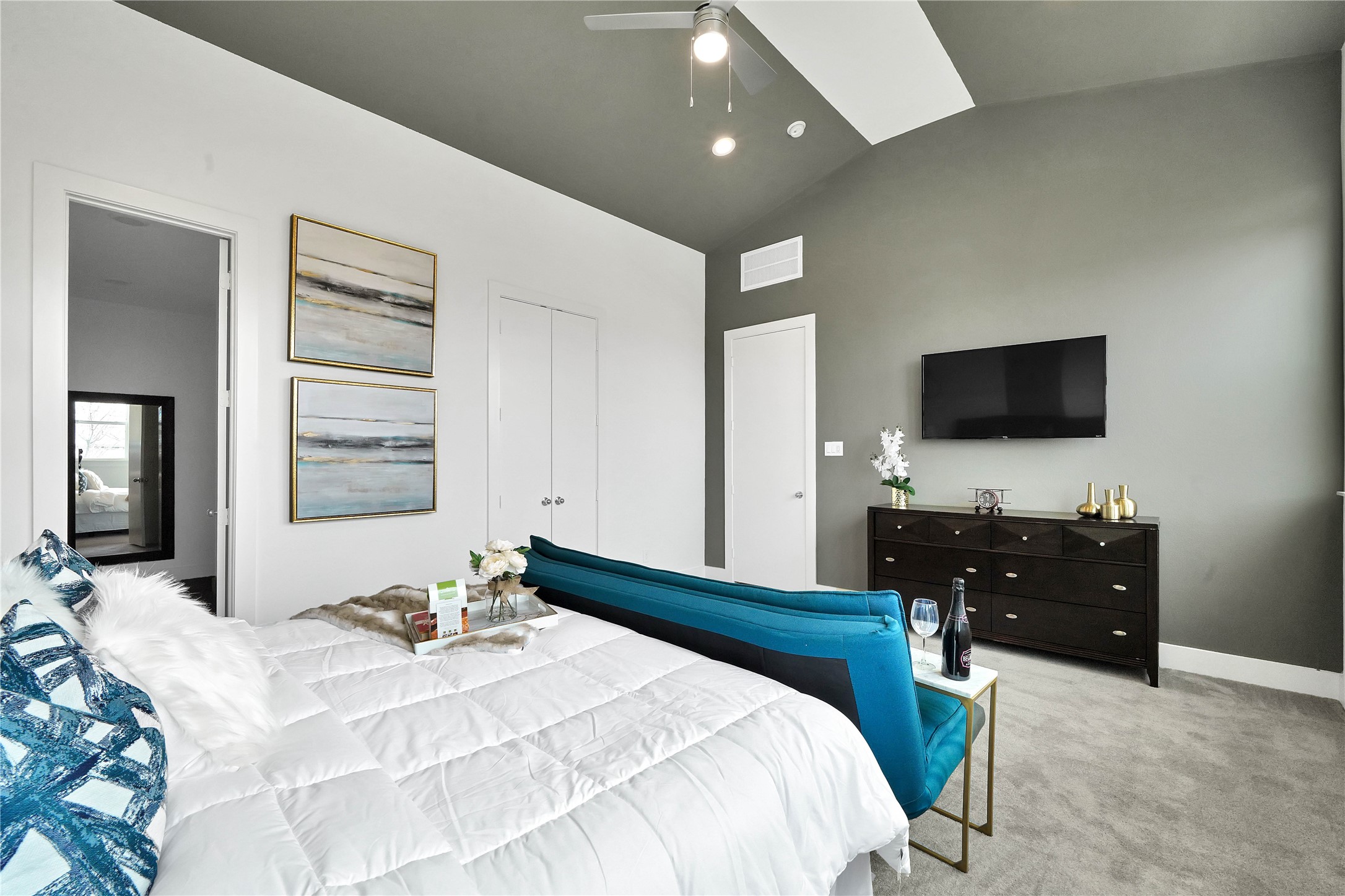 2916 Cline Street Houston, TX 77020 - Photo 13 of 19 a bedroom with a bed and a flat screen tv