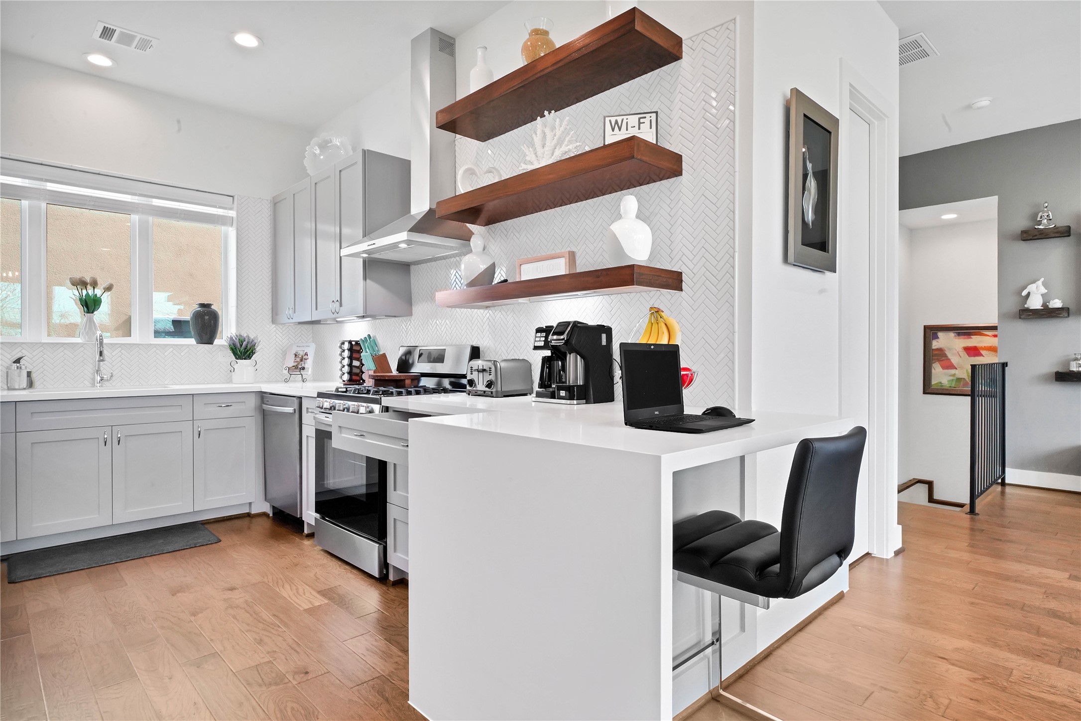 2916 Cline Street Houston, TX 77020 - Photo 6 of 19 a kitchen with a sink cabinets and window