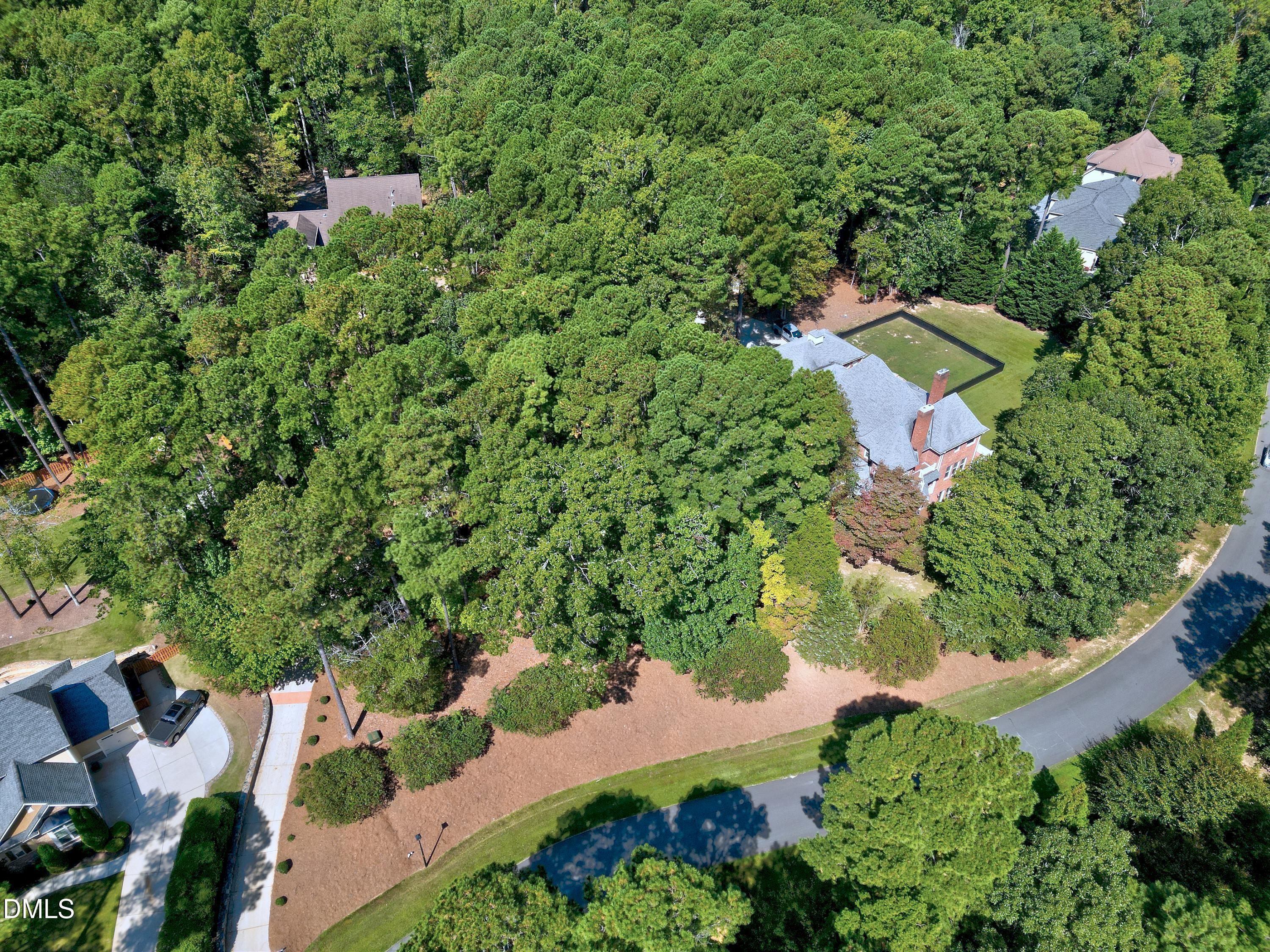6825 Mactavish Way Raleigh, NC 27613 - Photo 78 of 100 an aerial view of a house with a yard