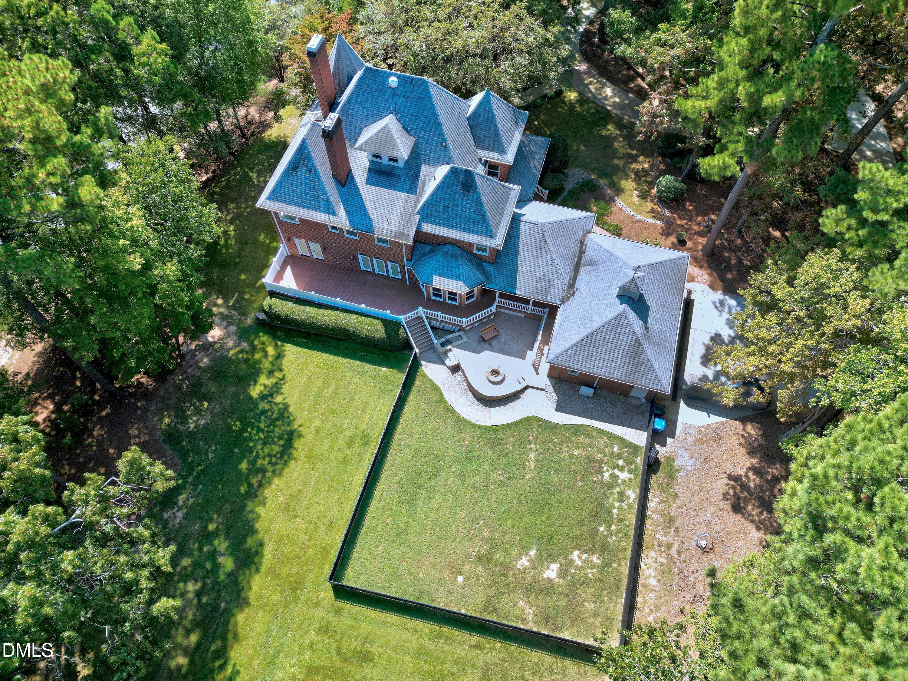 6825 Mactavish Way Raleigh, NC 27613 - Photo 91 of 100 an aerial view of residential house with outdoor space and swimming pool