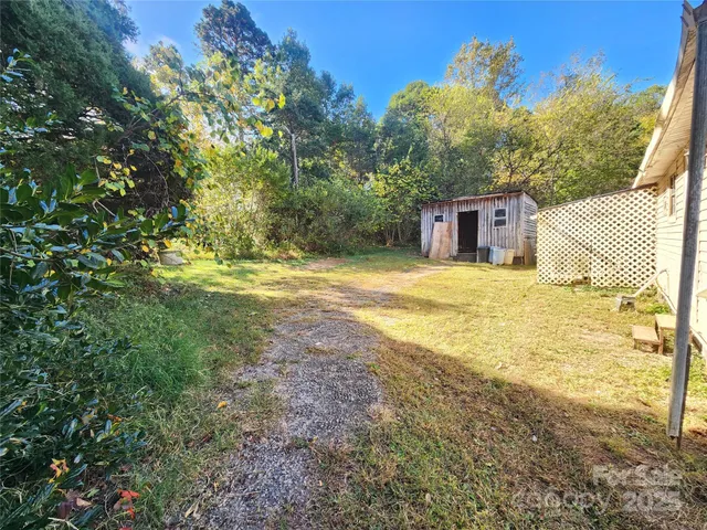 a view of a yard with an outdoor space