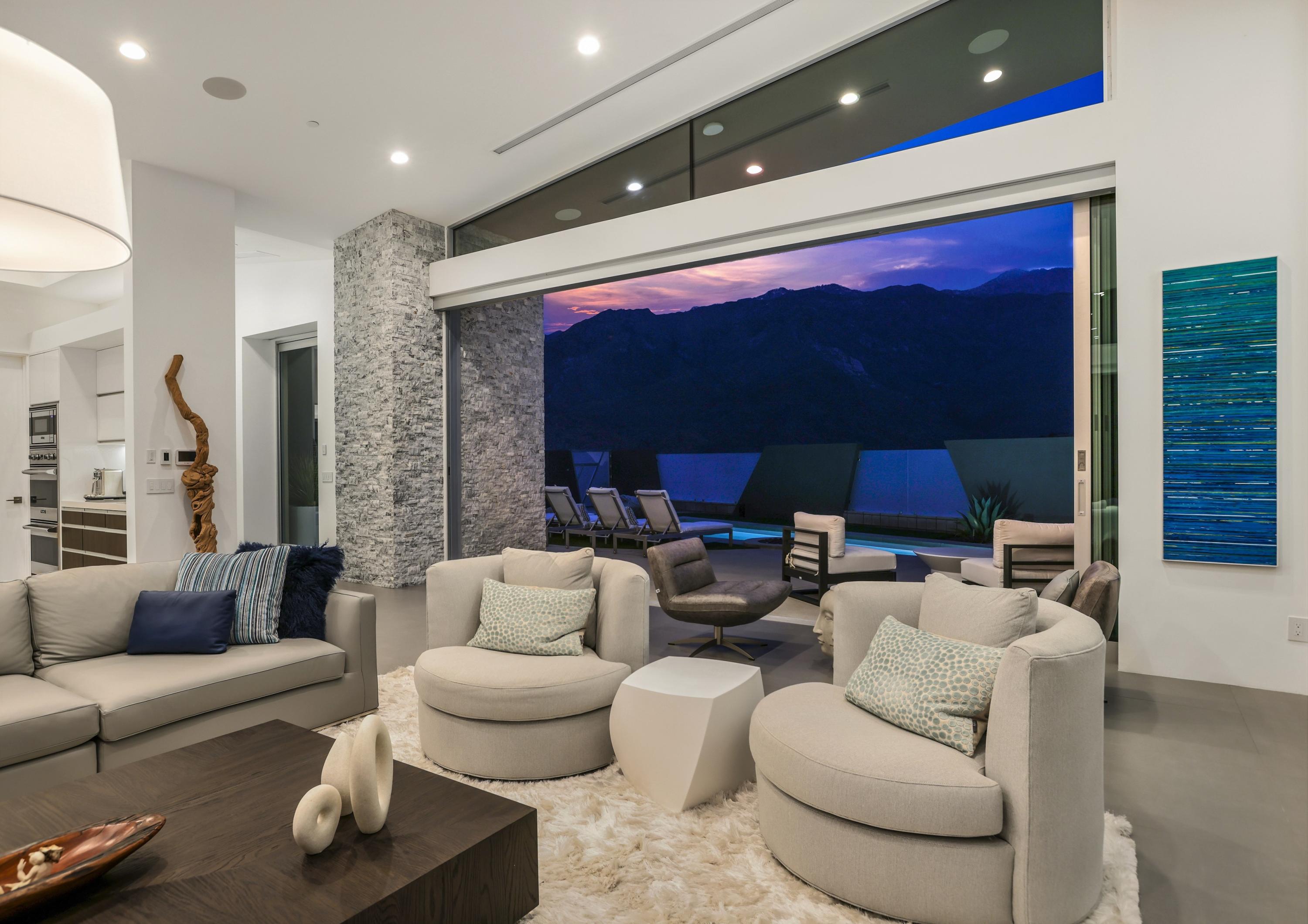 1747 Pinnacle Point Palm Springs, CA 92264 - Photo 19 of 76 a living room with furniture and a flat screen tv
