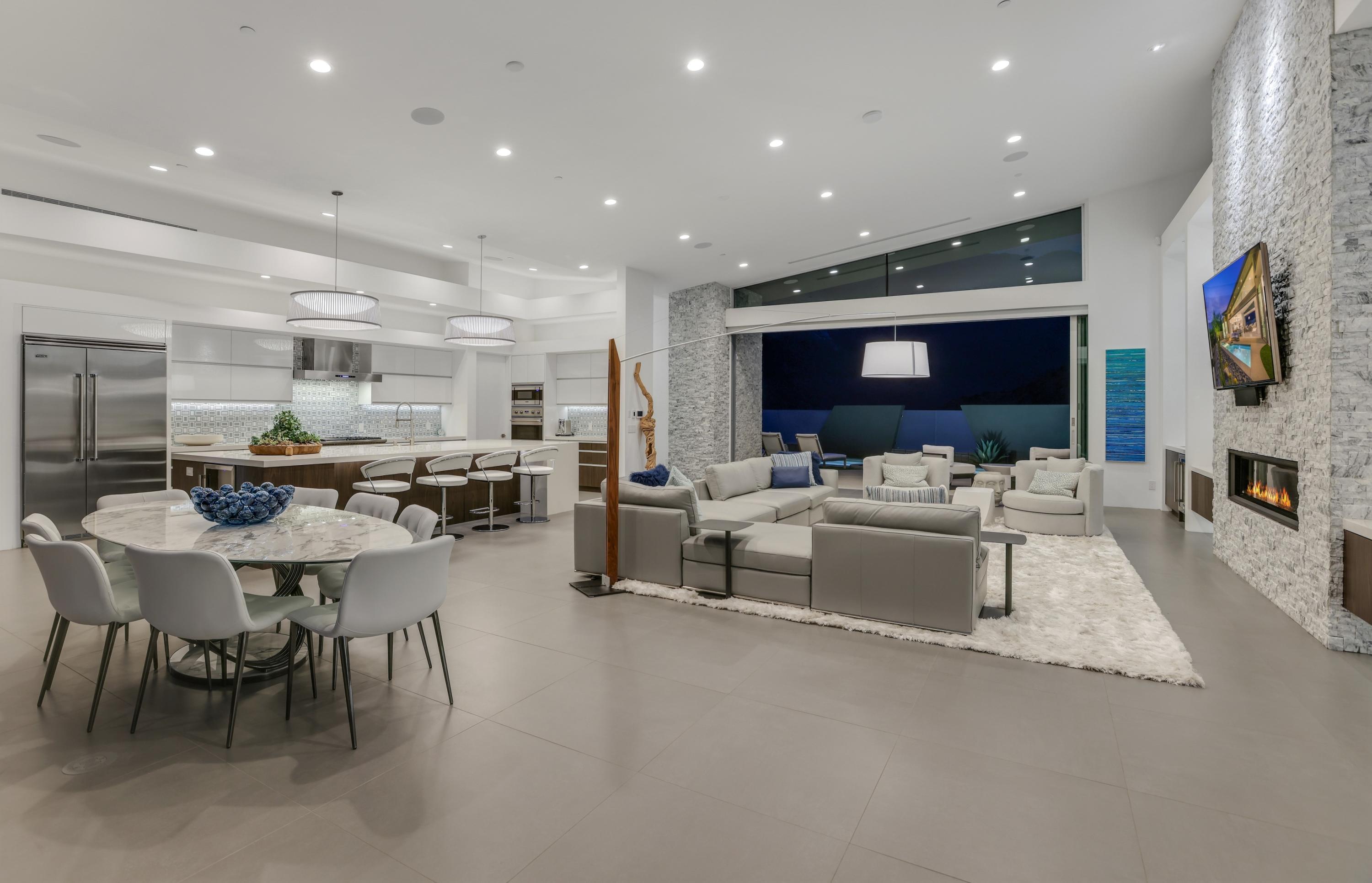 1747 Pinnacle Point Palm Springs, CA 92264 - Photo 3 of 76 a living room with stainless steel appliances furniture and a kitchen view