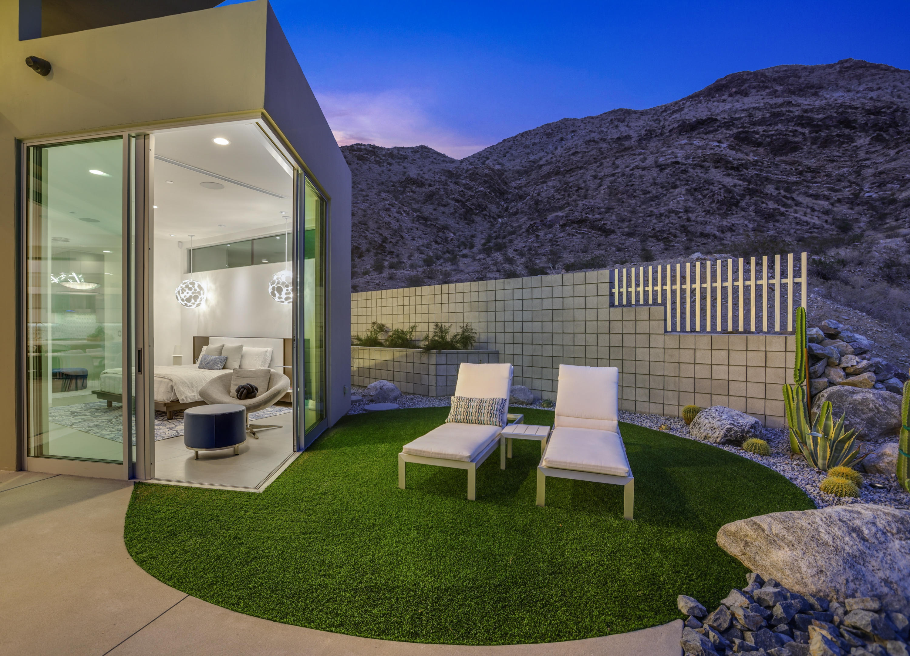 1747 Pinnacle Point Palm Springs, CA 92264 - Photo 25 of 76 a view of a chair and tables in the patio