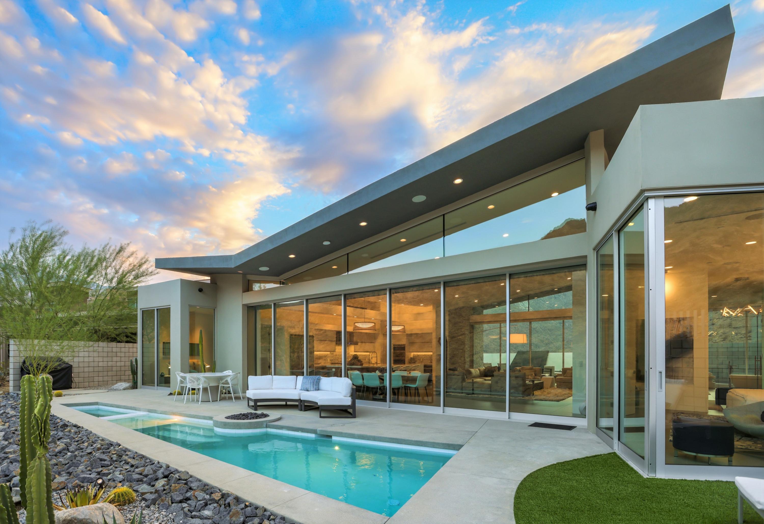 1747 Pinnacle Point Palm Springs, CA 92264 - Photo 45 of 76 a view of a house with backyard porch and sitting area
