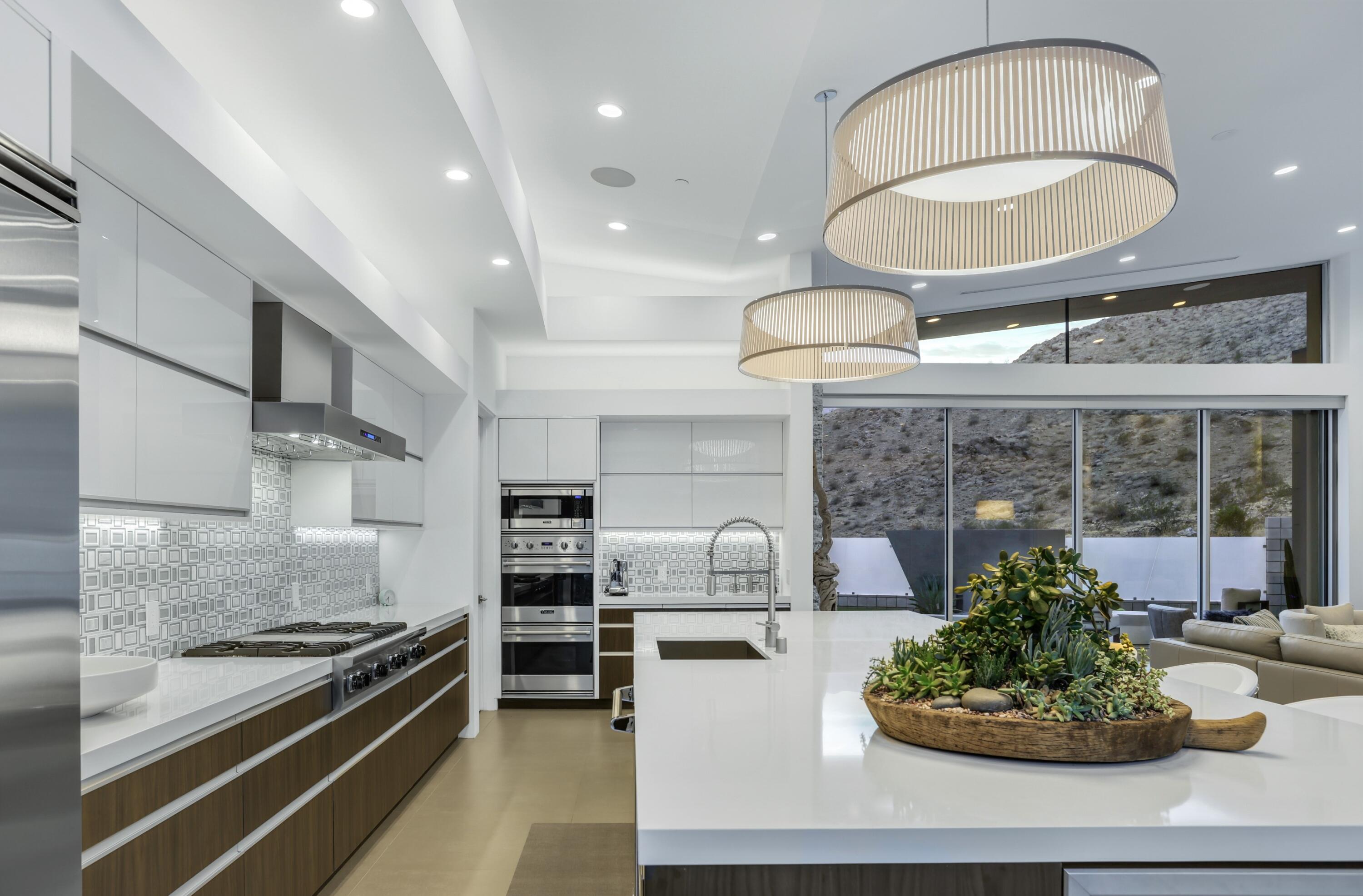 1747 Pinnacle Point Palm Springs, CA 92264 - Photo 53 of 76 a kitchen with furniture and a stove