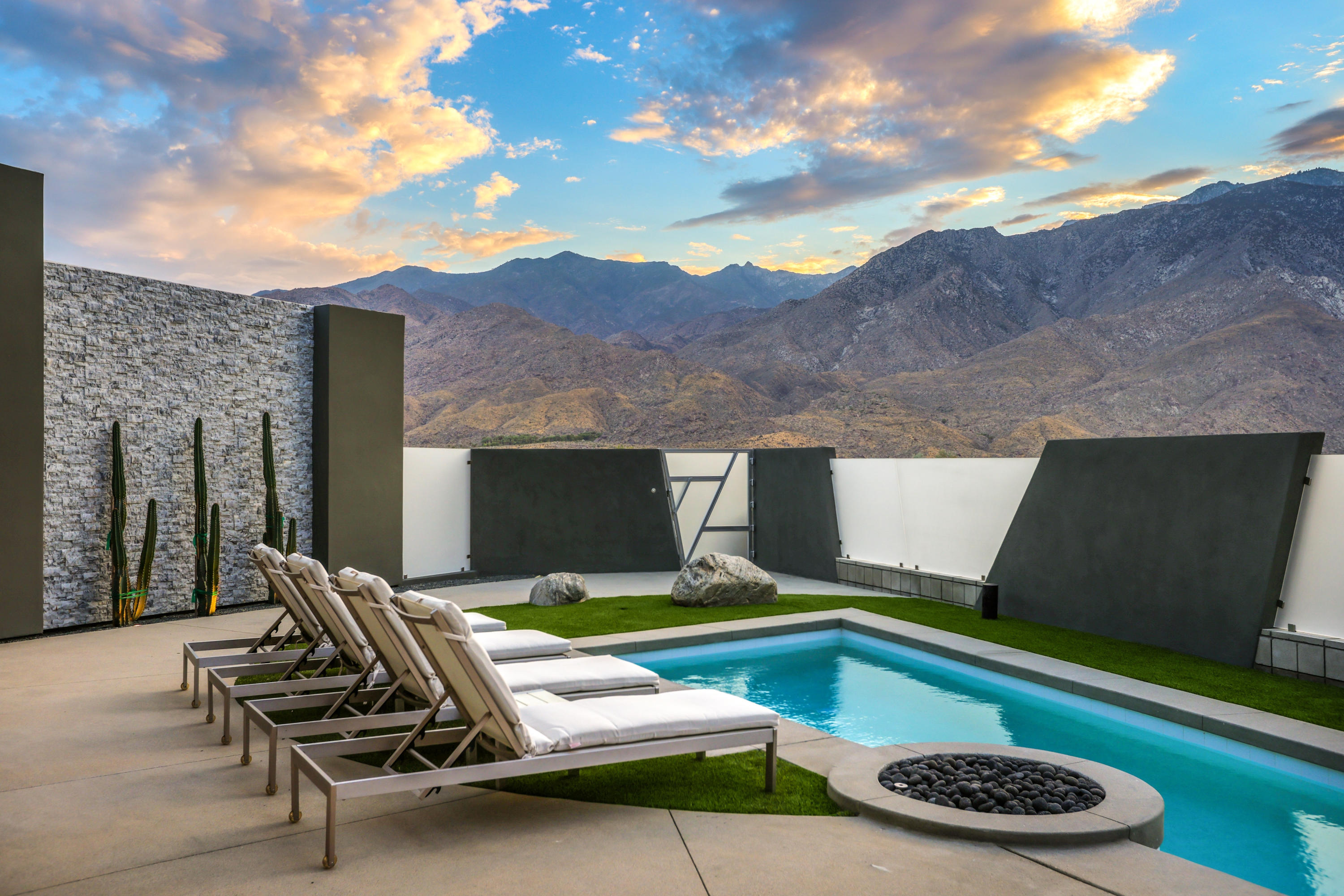 1747 Pinnacle Point Palm Springs, CA 92264 - Photo 68 of 76 a backyard of a house with seating space