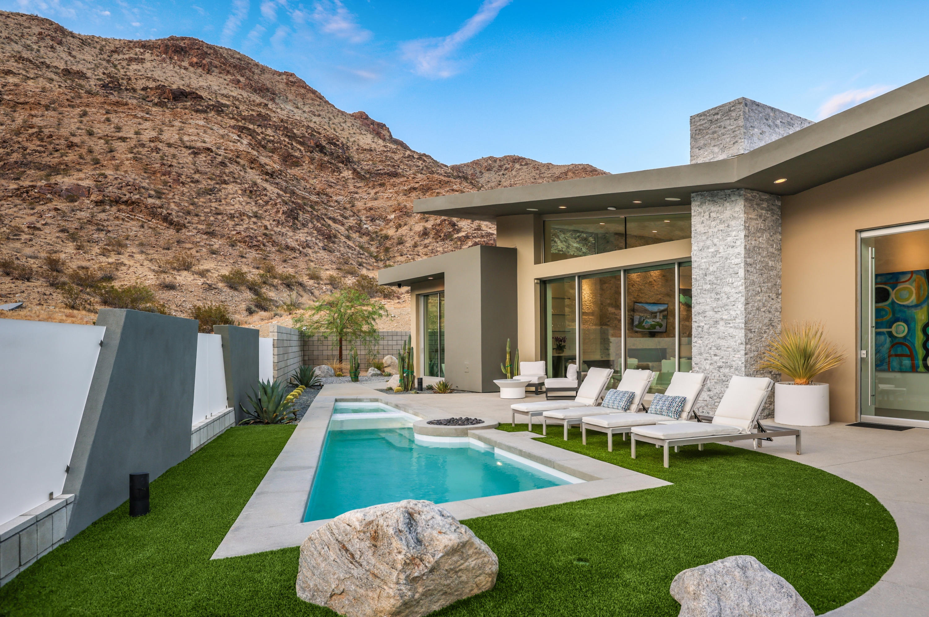 1747 Pinnacle Point Palm Springs, CA 92264 - Photo 71 of 76 a view of a house with backyard porch and patio