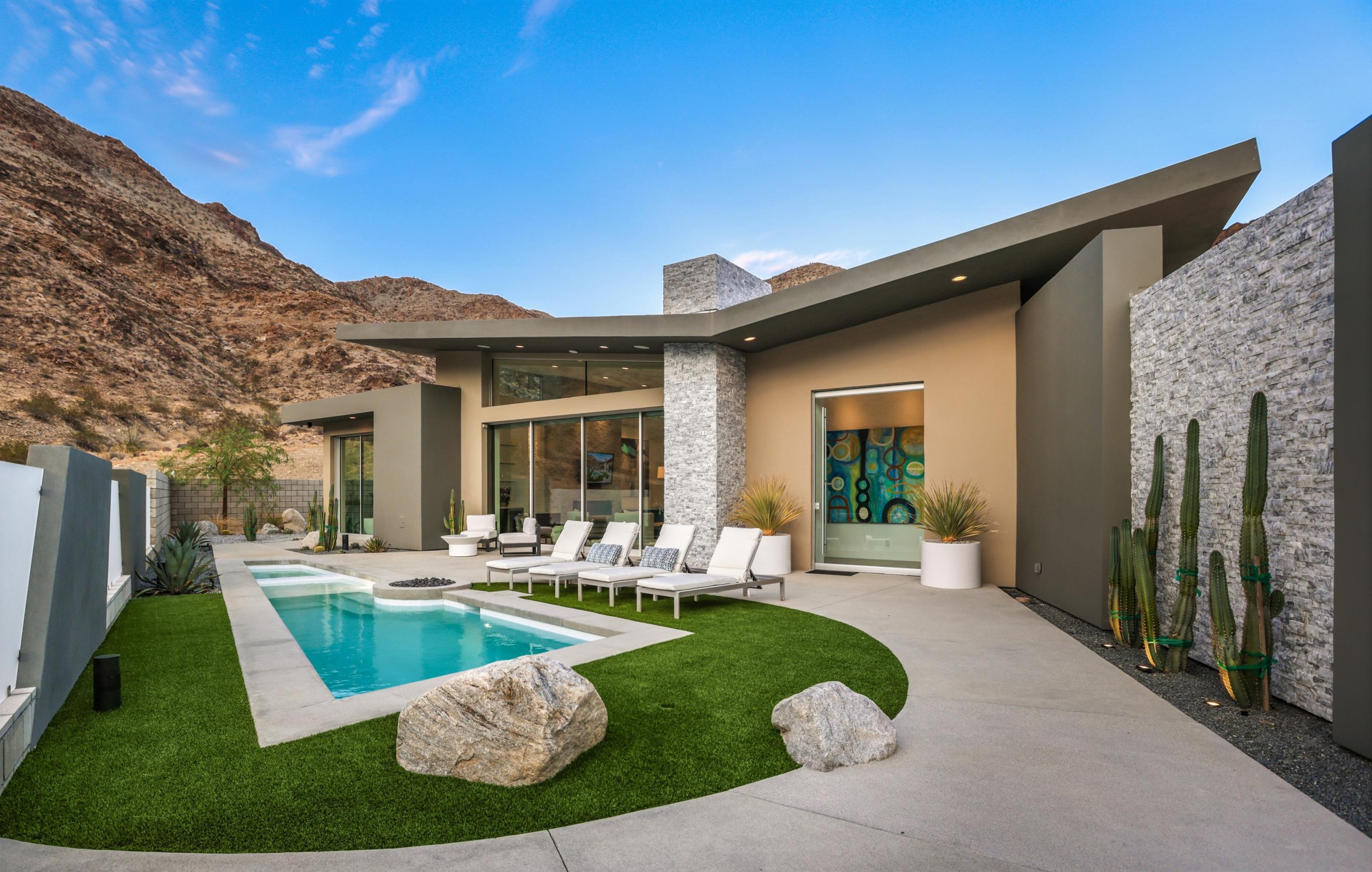 1747 Pinnacle Point Palm Springs, CA 92264 - Photo 72 of 76 a view of a house with swimming pool and sitting area