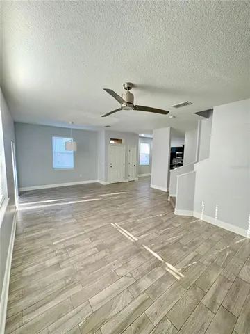 a bathroom with a shower and a toilet