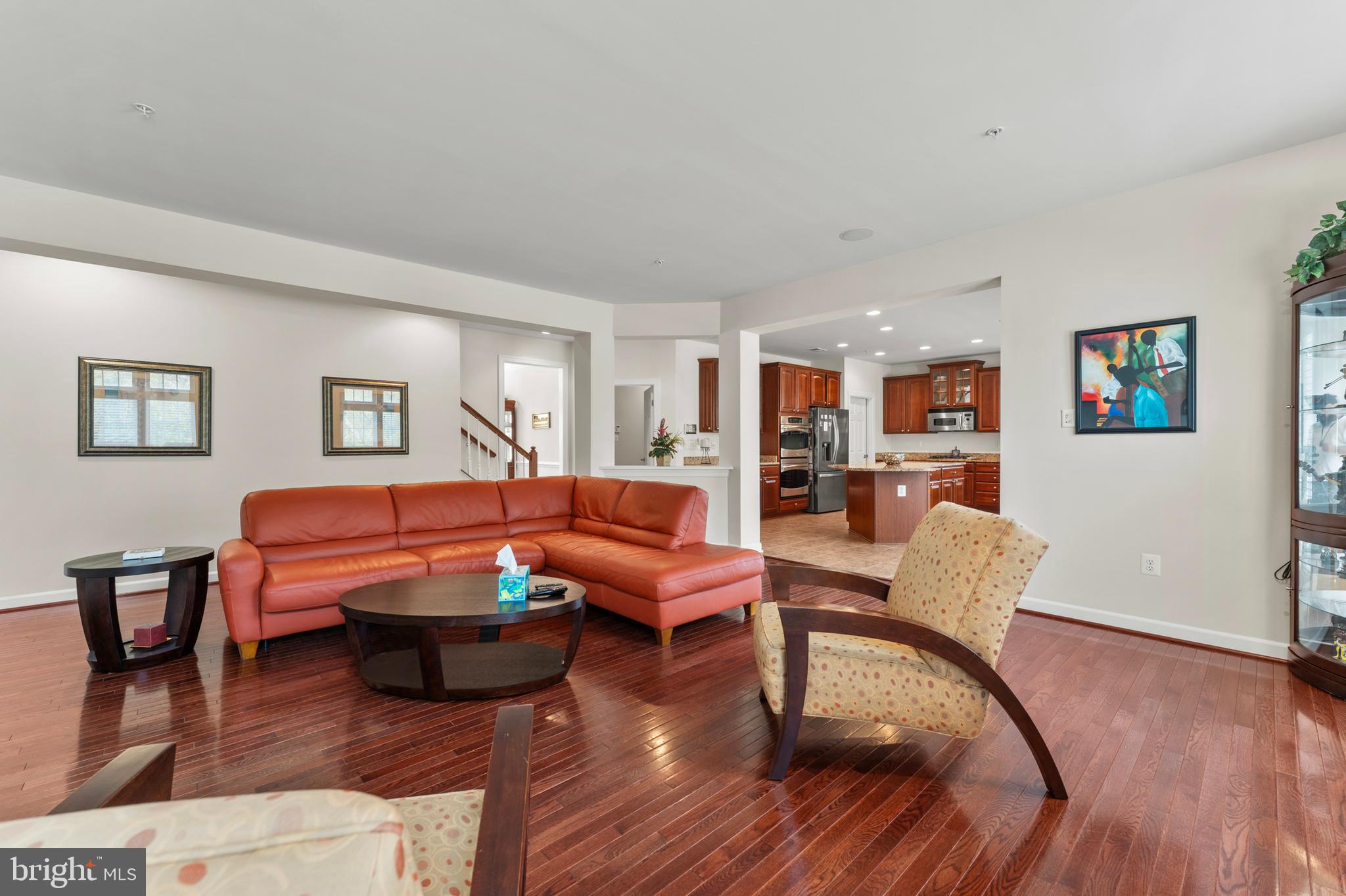 10916 Sir Paul Place Clinton, MD 20735 - Photo 21 of 66 a living room with furniture and wooden floor