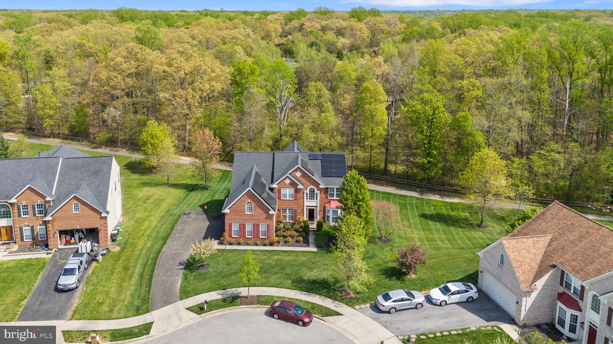 10916 Sir Paul Place Clinton, MD 20735 - Photo 3 of 66 an aerial view of a house with garden space and street view