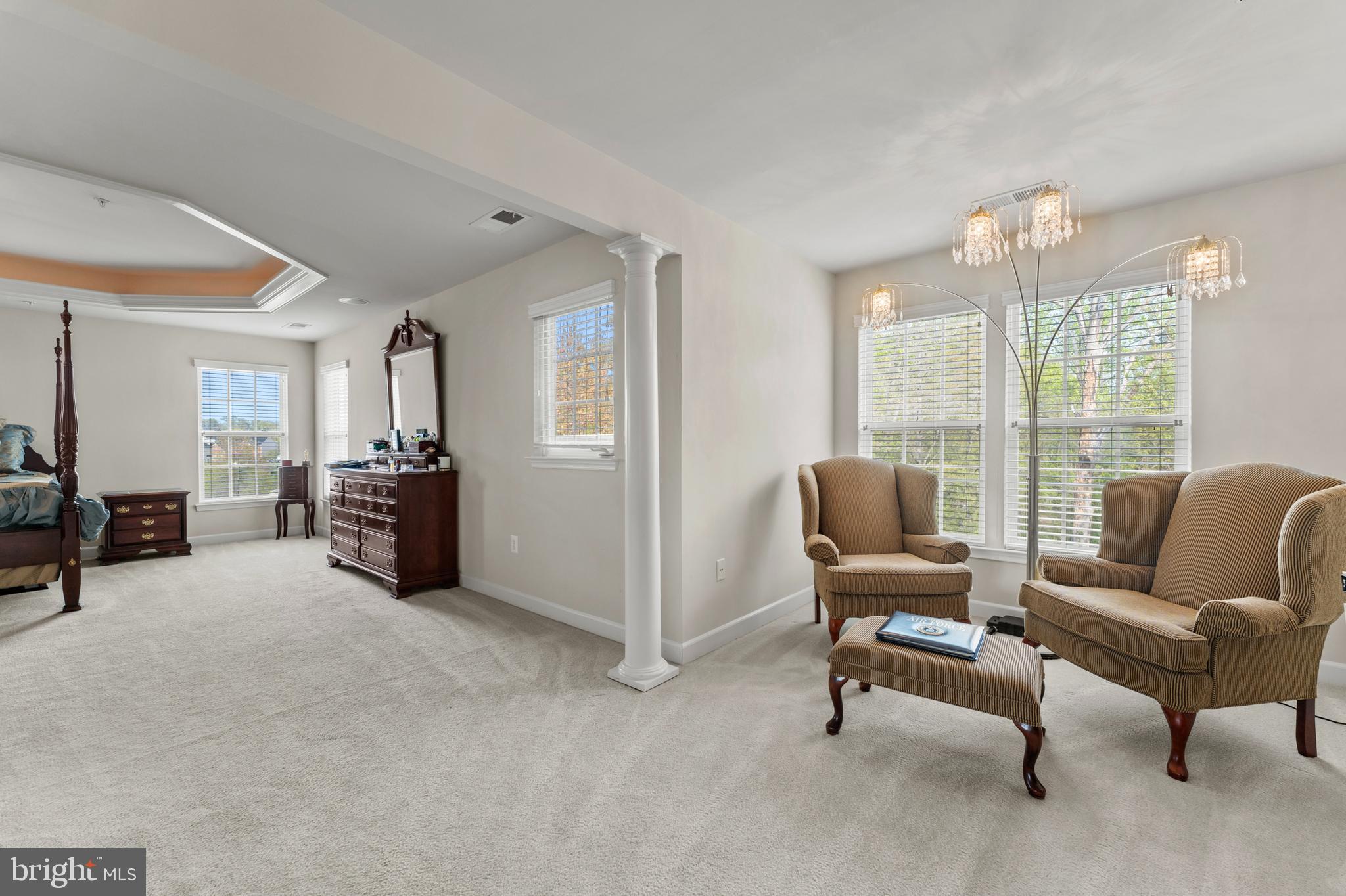 10916 Sir Paul Place Clinton, MD 20735 - Photo 37 of 66 a living room with furniture and a large window