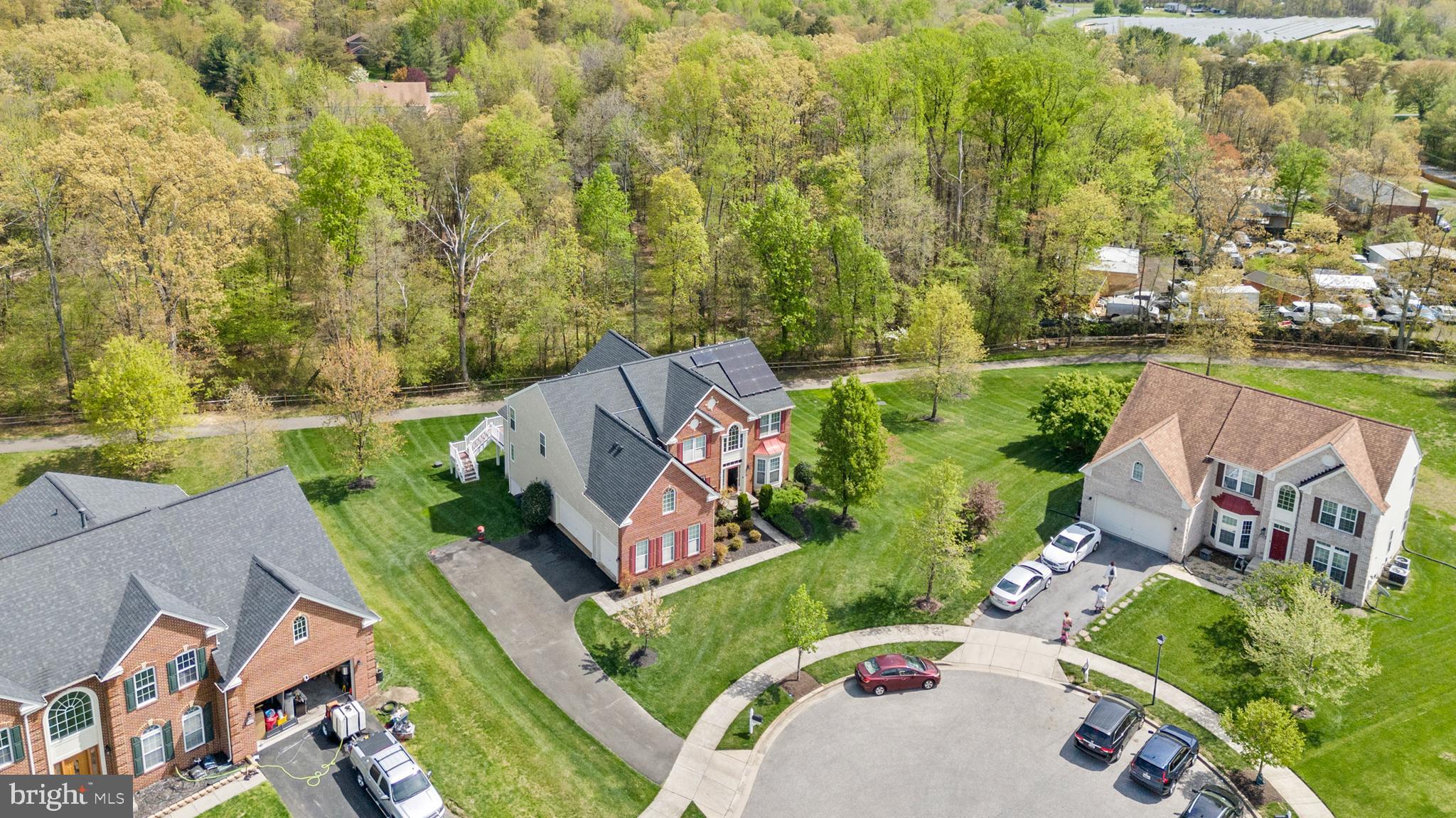 10916 Sir Paul Place Clinton, MD 20735 - Photo 4 of 66 an aerial view of a house with outdoor space