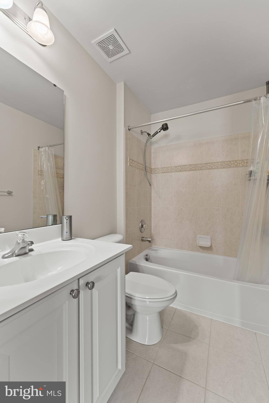 10916 Sir Paul Place Clinton, MD 20735 - Photo 45 of 66 a bathroom with a sink a toilet and shower