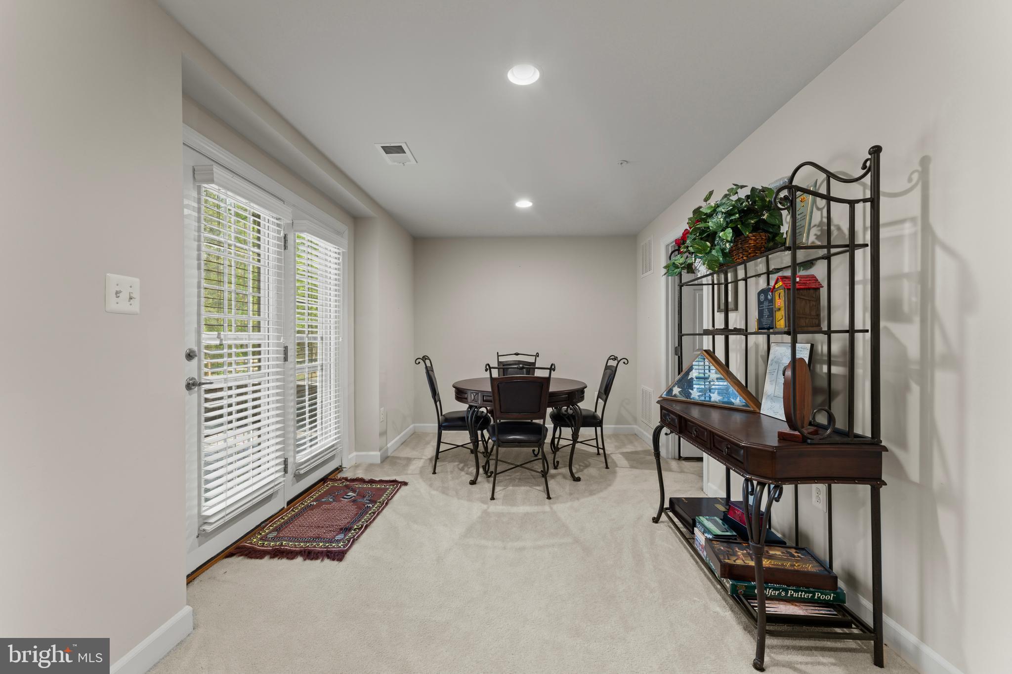 10916 Sir Paul Place Clinton, MD 20735 - Photo 53 of 66 a view of a livingroom with furniture and front door