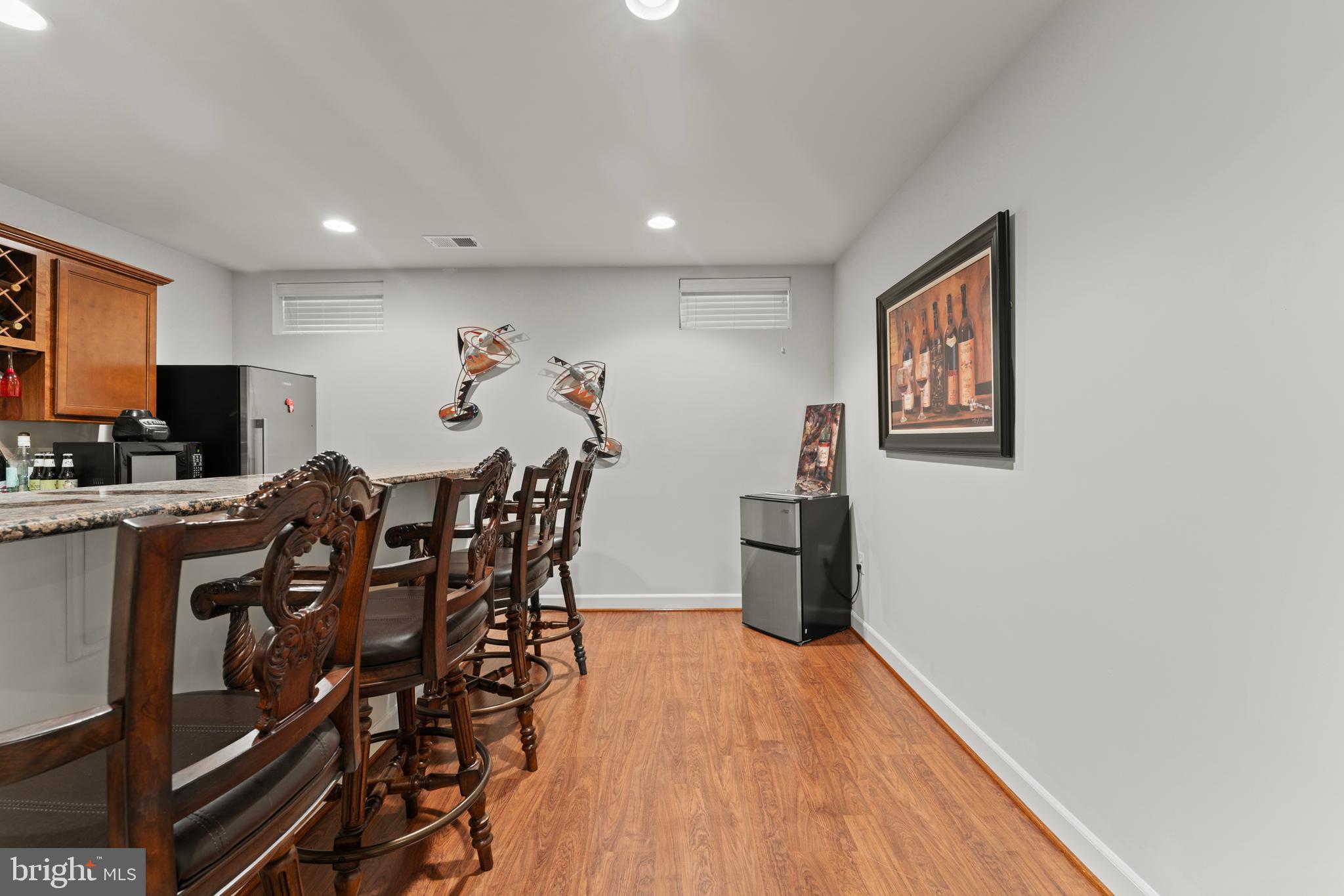 10916 Sir Paul Place Clinton, MD 20735 - Photo 59 of 66 a view of a dining room with furniture