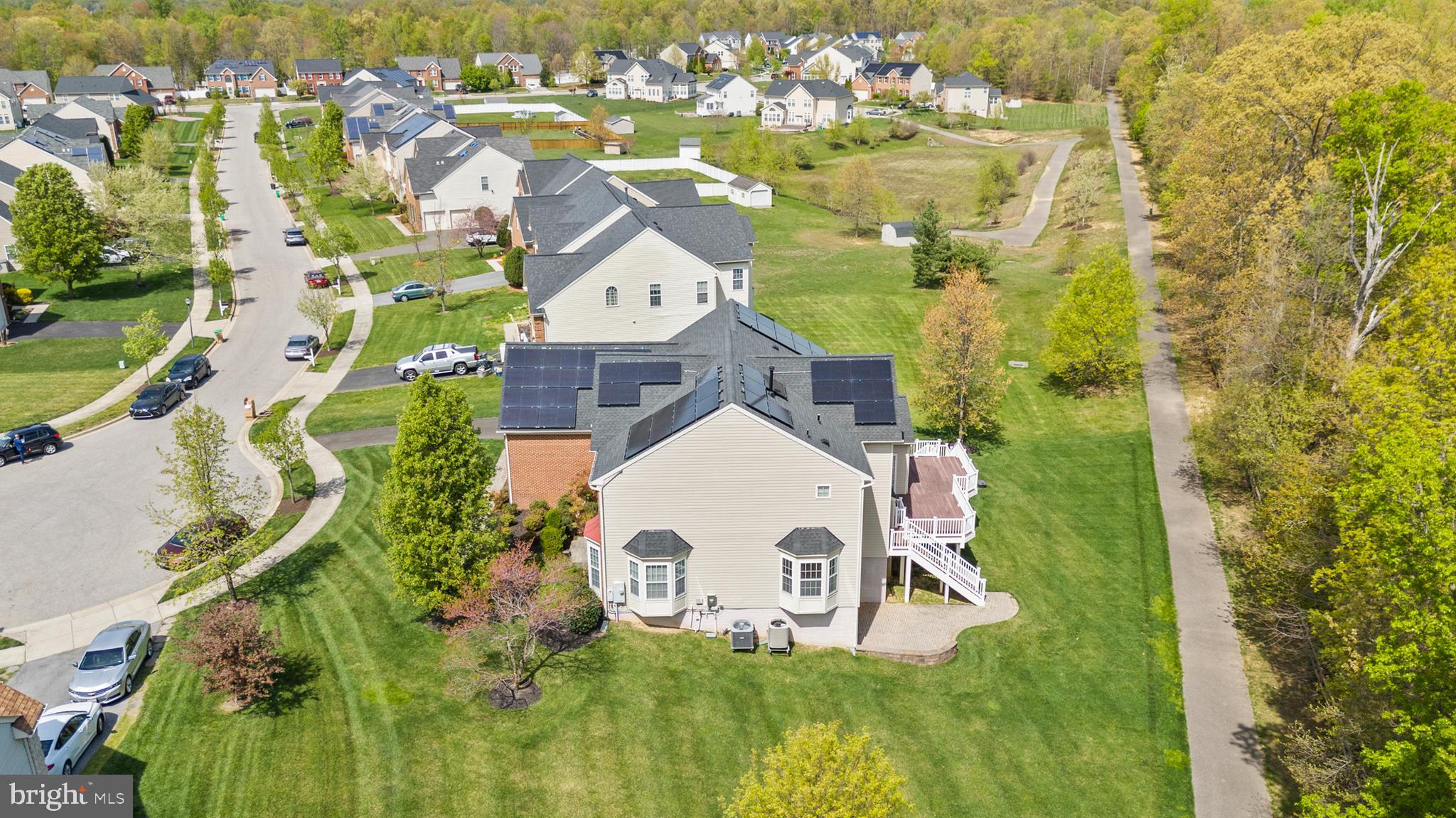 10916 Sir Paul Place Clinton, MD 20735 - Photo 6 of 66 a view of a house with a swimming pool