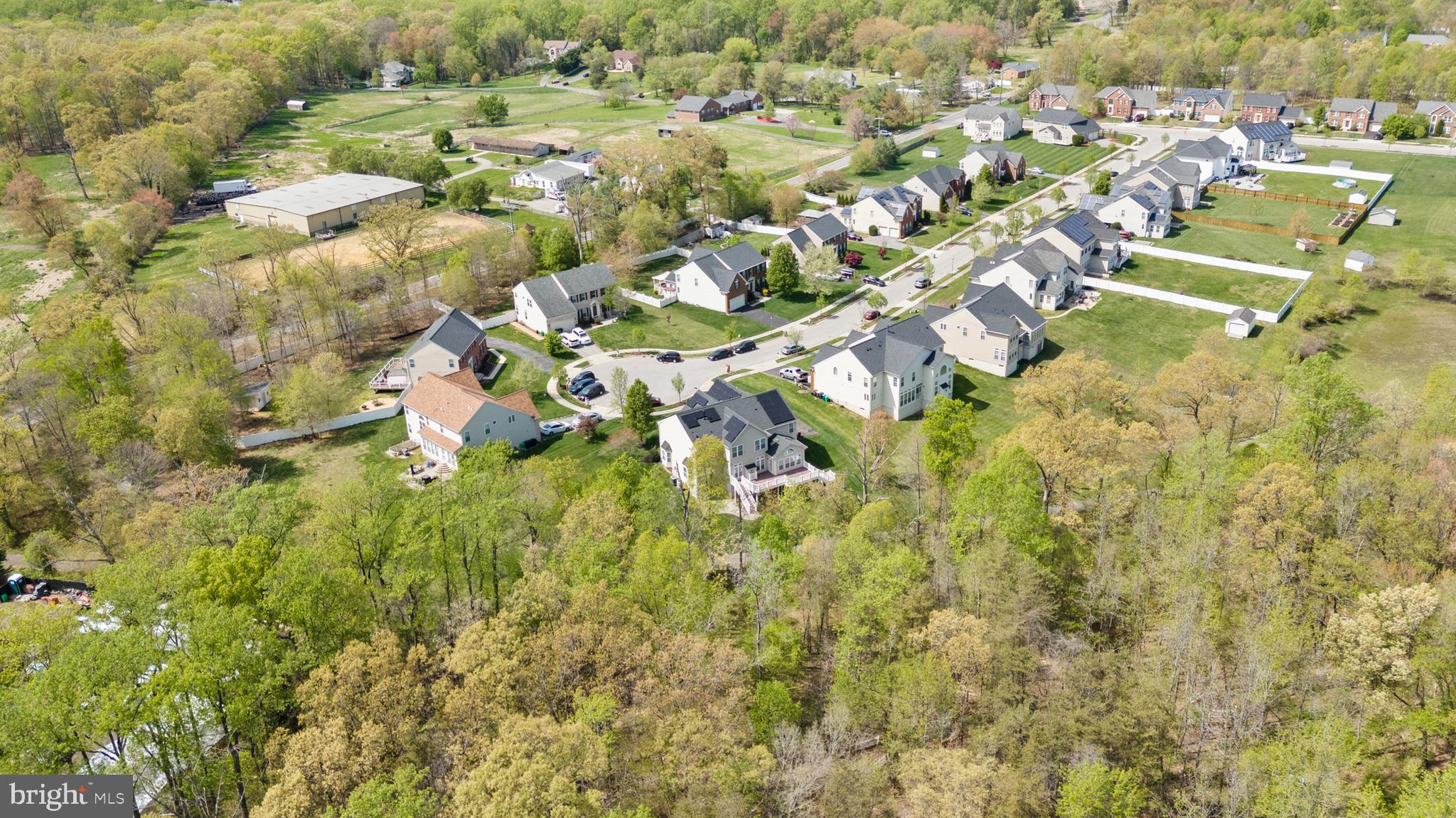 10916 Sir Paul Place Clinton, MD 20735 - Photo 8 of 66 an aerial view of residential houses with outdoor space and trees