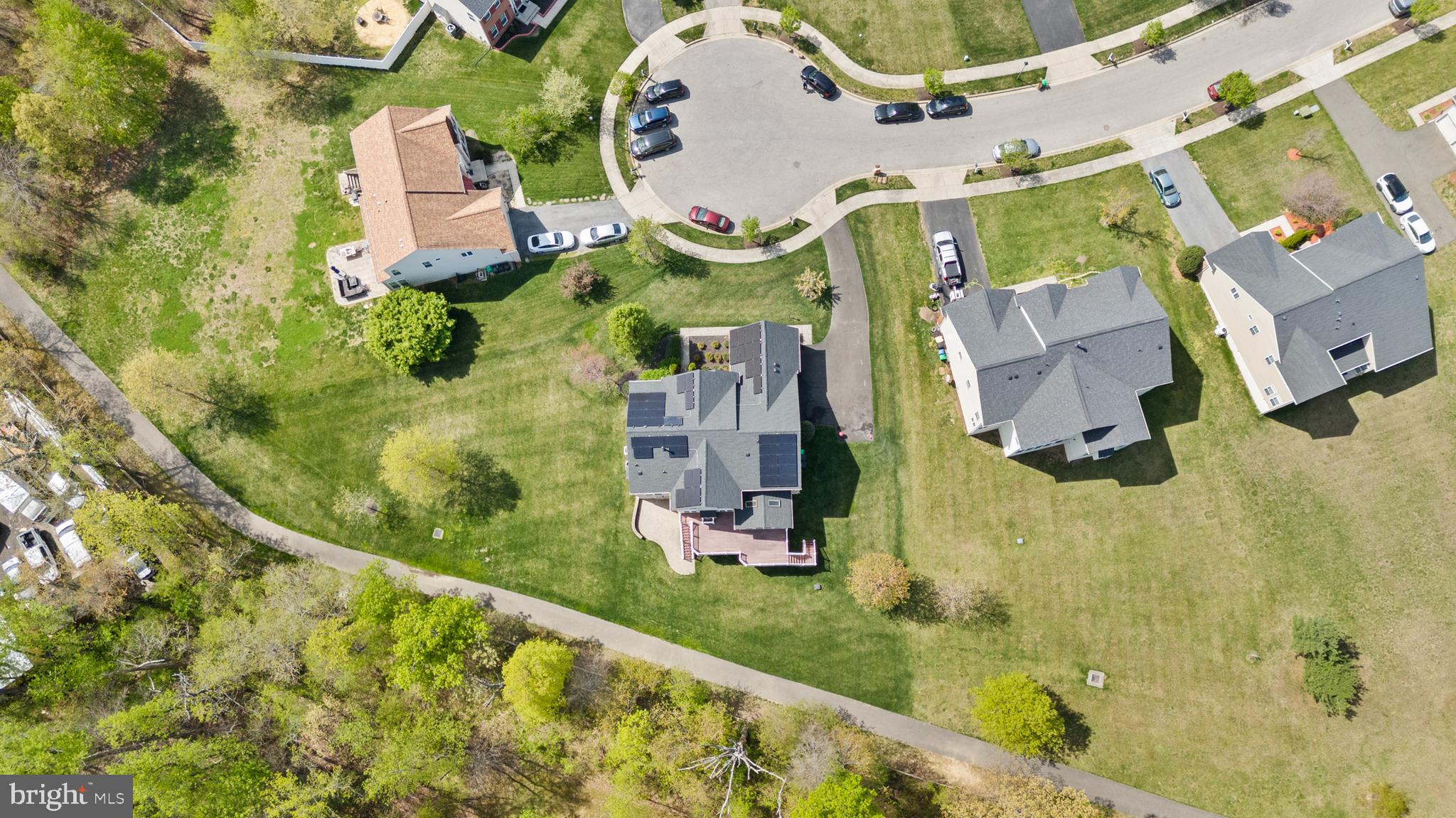 10916 Sir Paul Place Clinton, MD 20735 - Photo 9 of 66 an aerial view of residential house with outdoor space and swimming pool